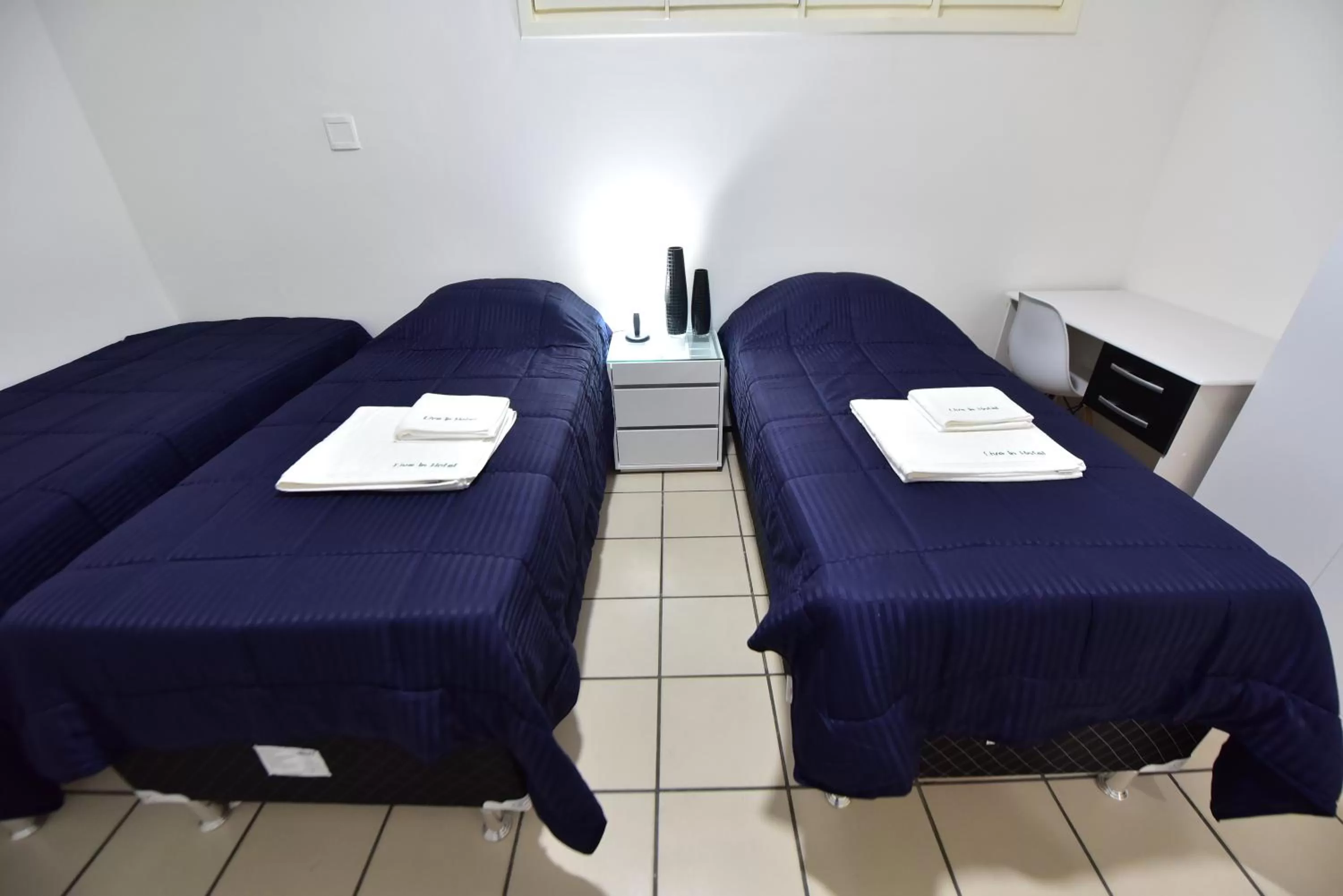 Bed in LIVE IN FORTALEZA HOTEL