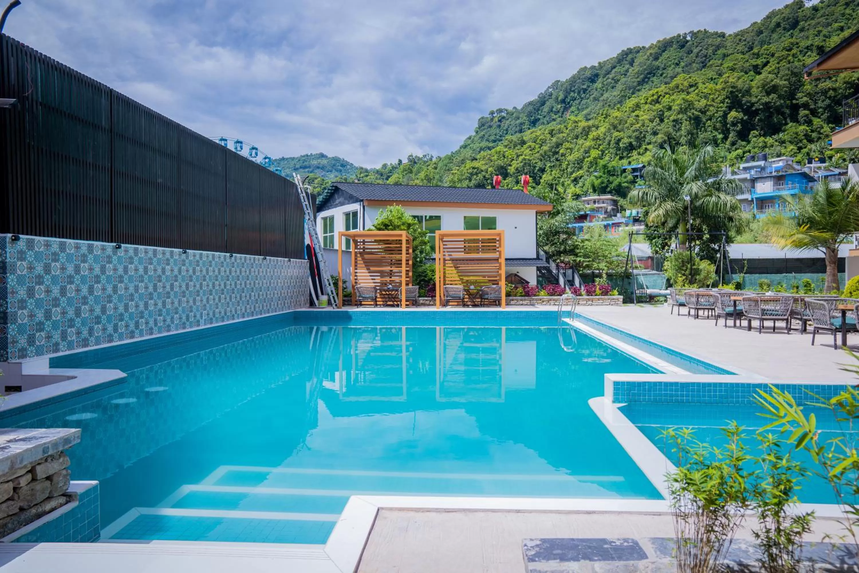 Swimming pool in Majestic Lake Front Hotel & Suites