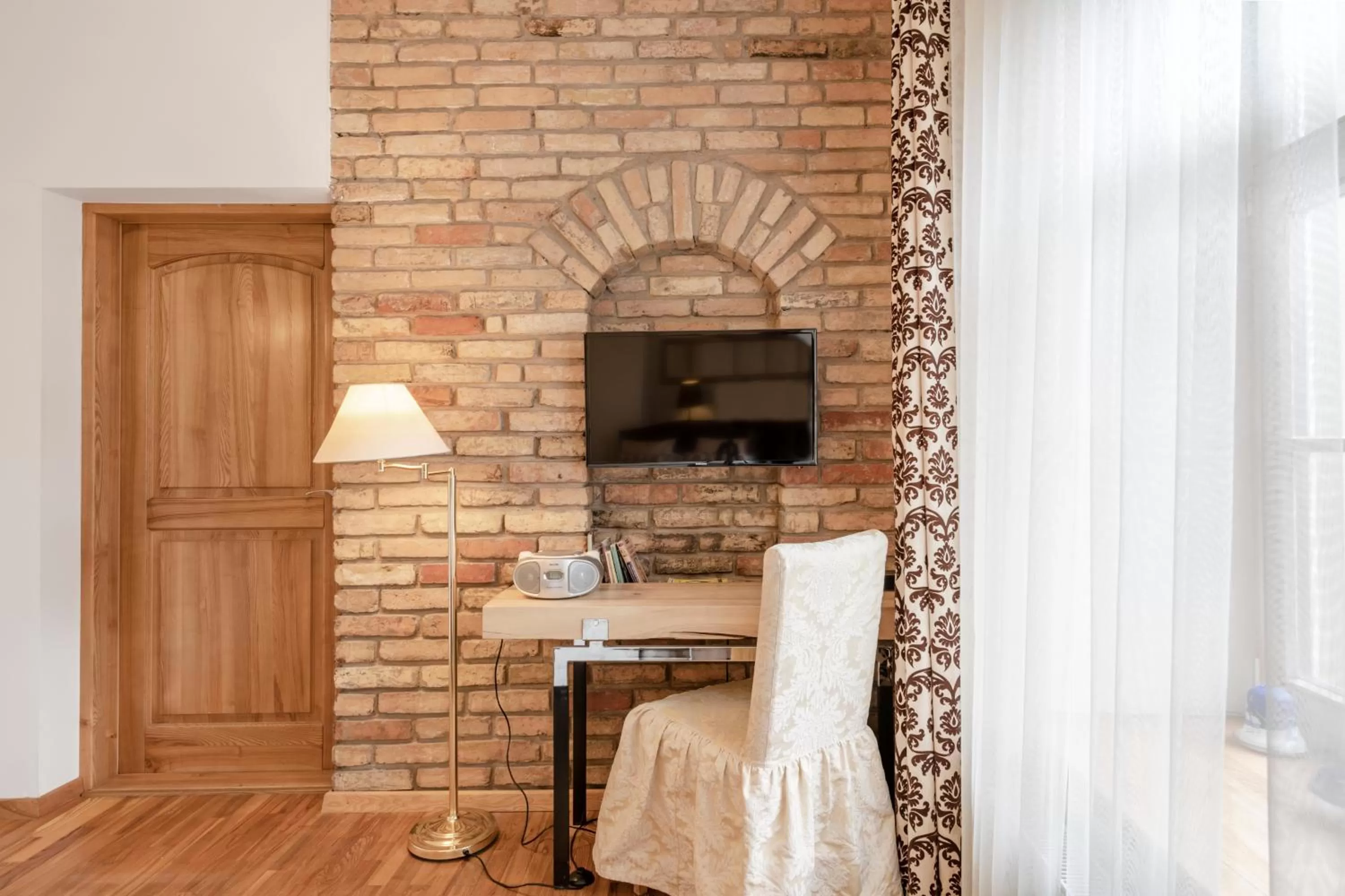 TV and multimedia, Seating Area in Vilnius Apartments