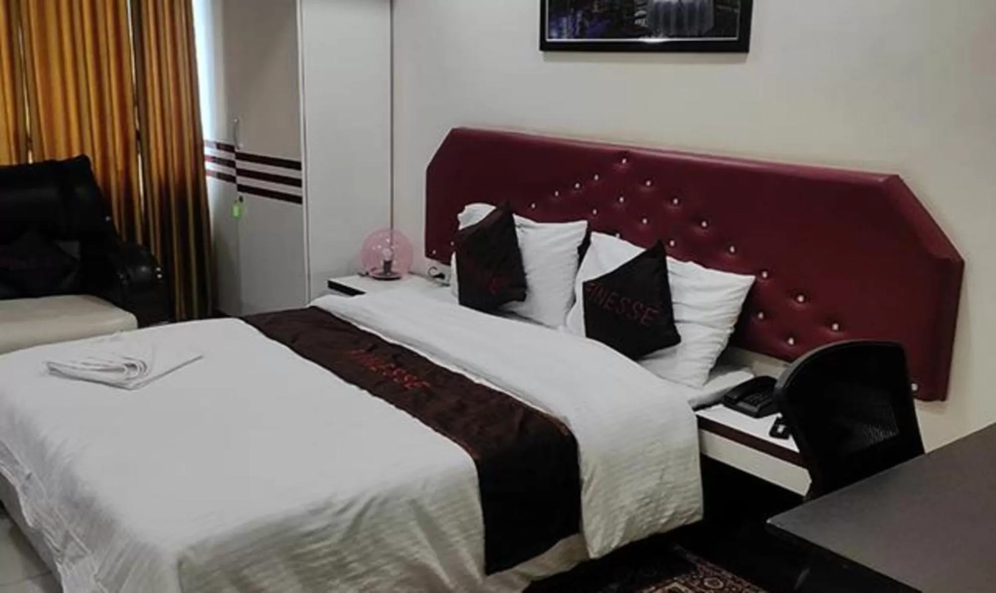 Bed in FabHotel Prime Finesse