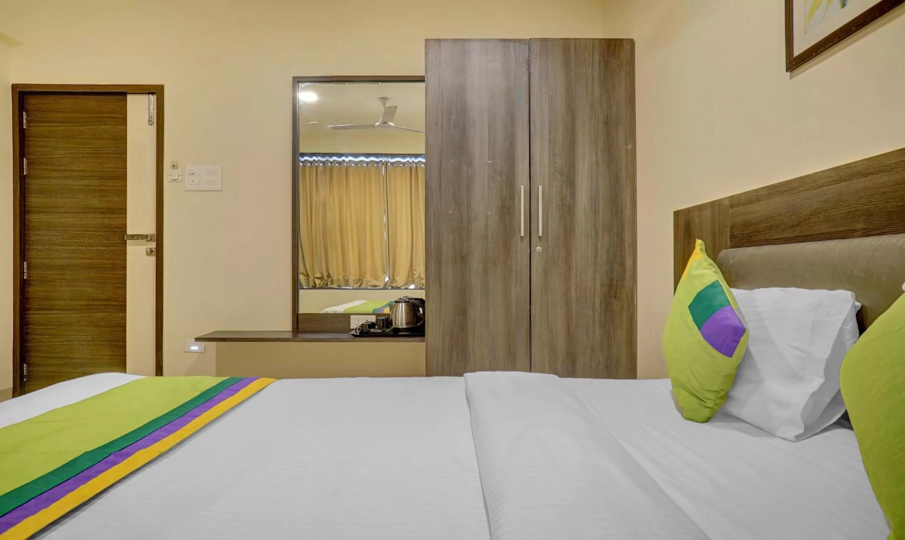 Bedroom, Bed in Treebo Bhagyashree Executive