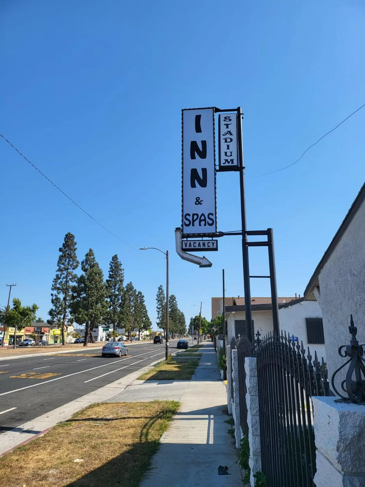 Property logo or sign in Stadium Inn & Spas