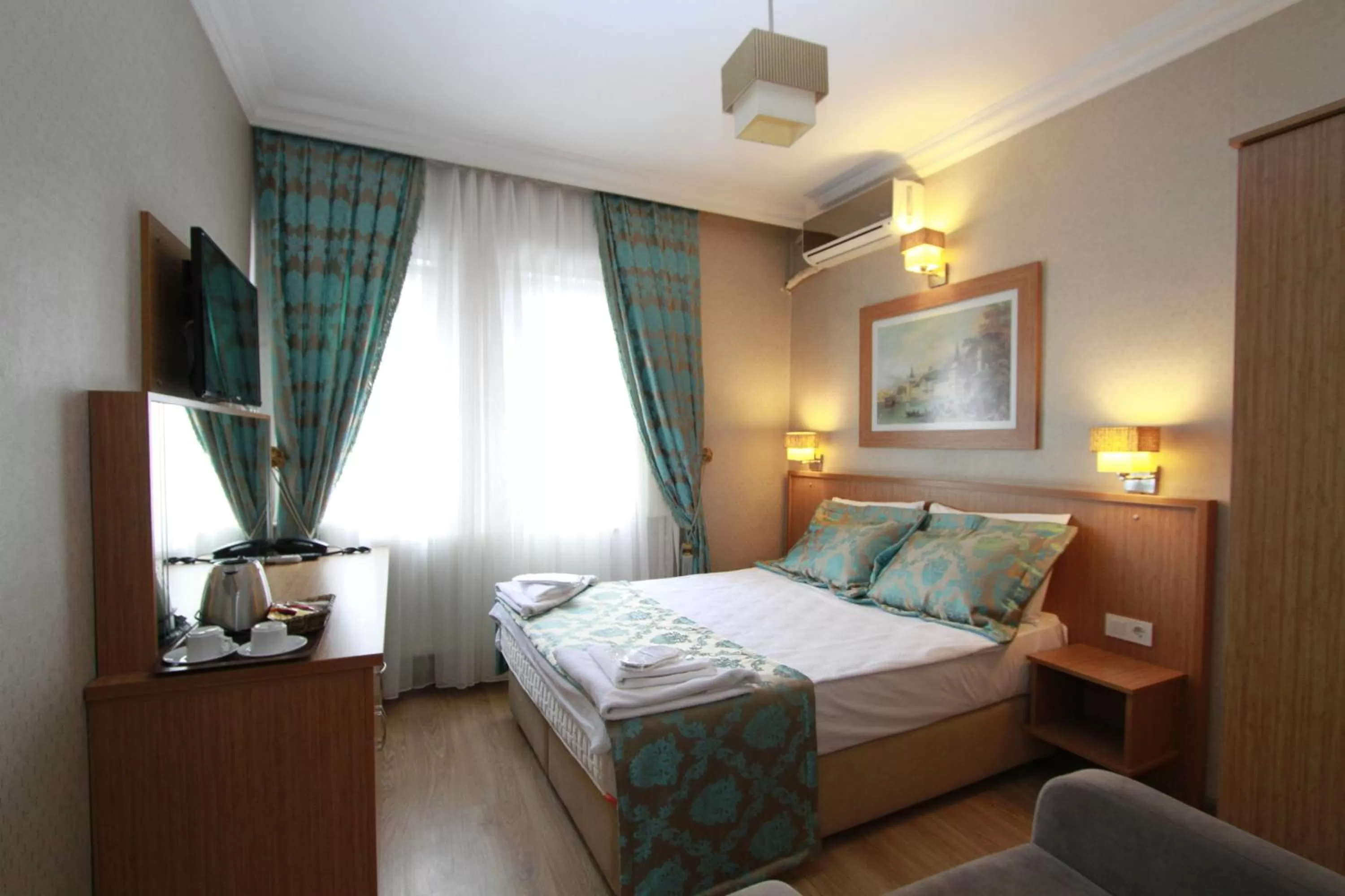 Photo of the whole room, Bed in Agora Boutique Hotel & Bistro