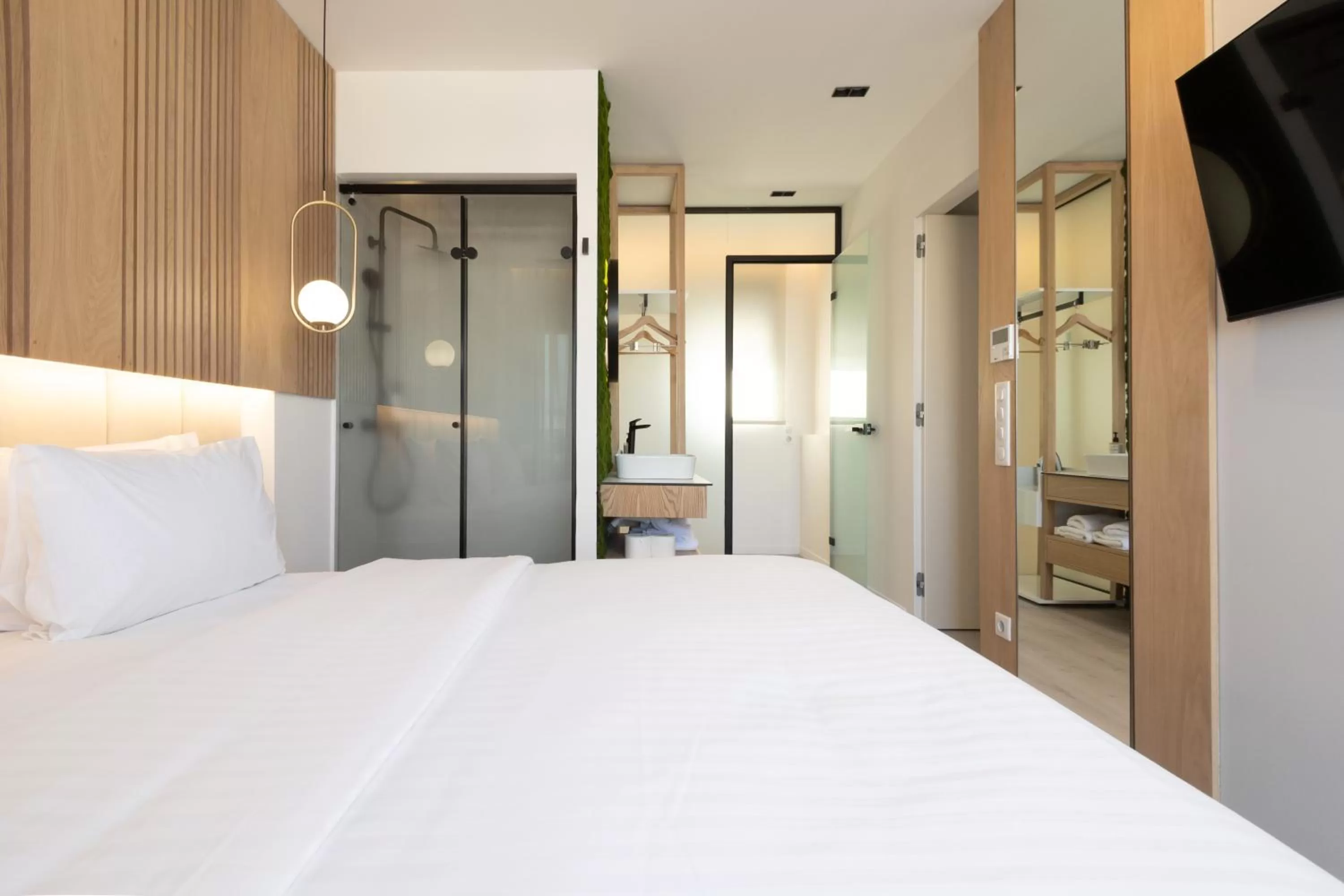 Bed in Incanto Boutique Suites - Neos Kosmos