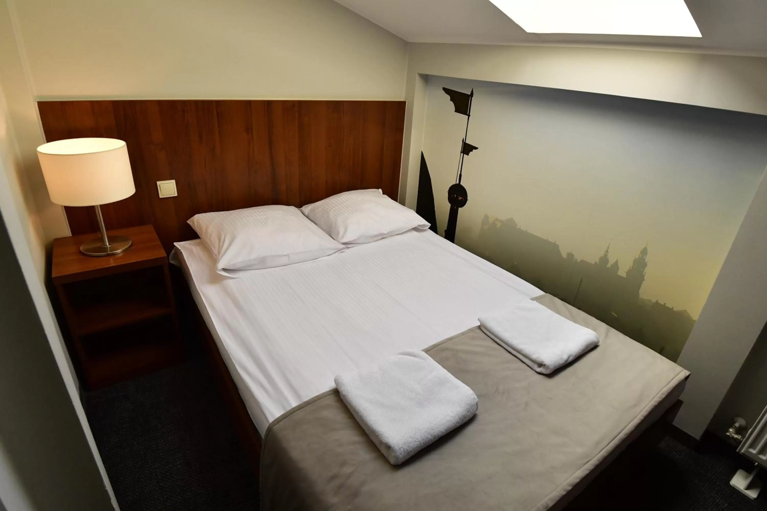 Bed in Hotel Downtown Kraków