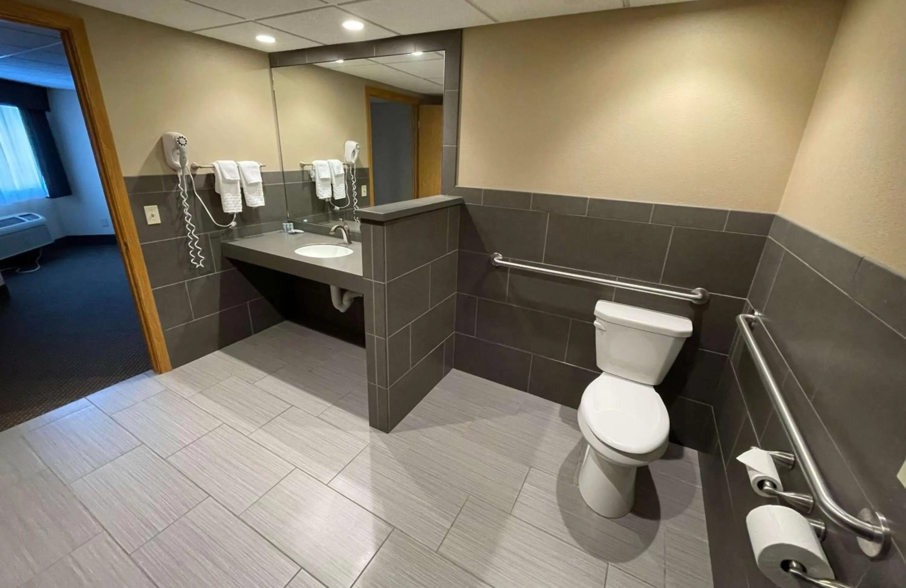 Bathroom in Crossroads Hotel & Event Center