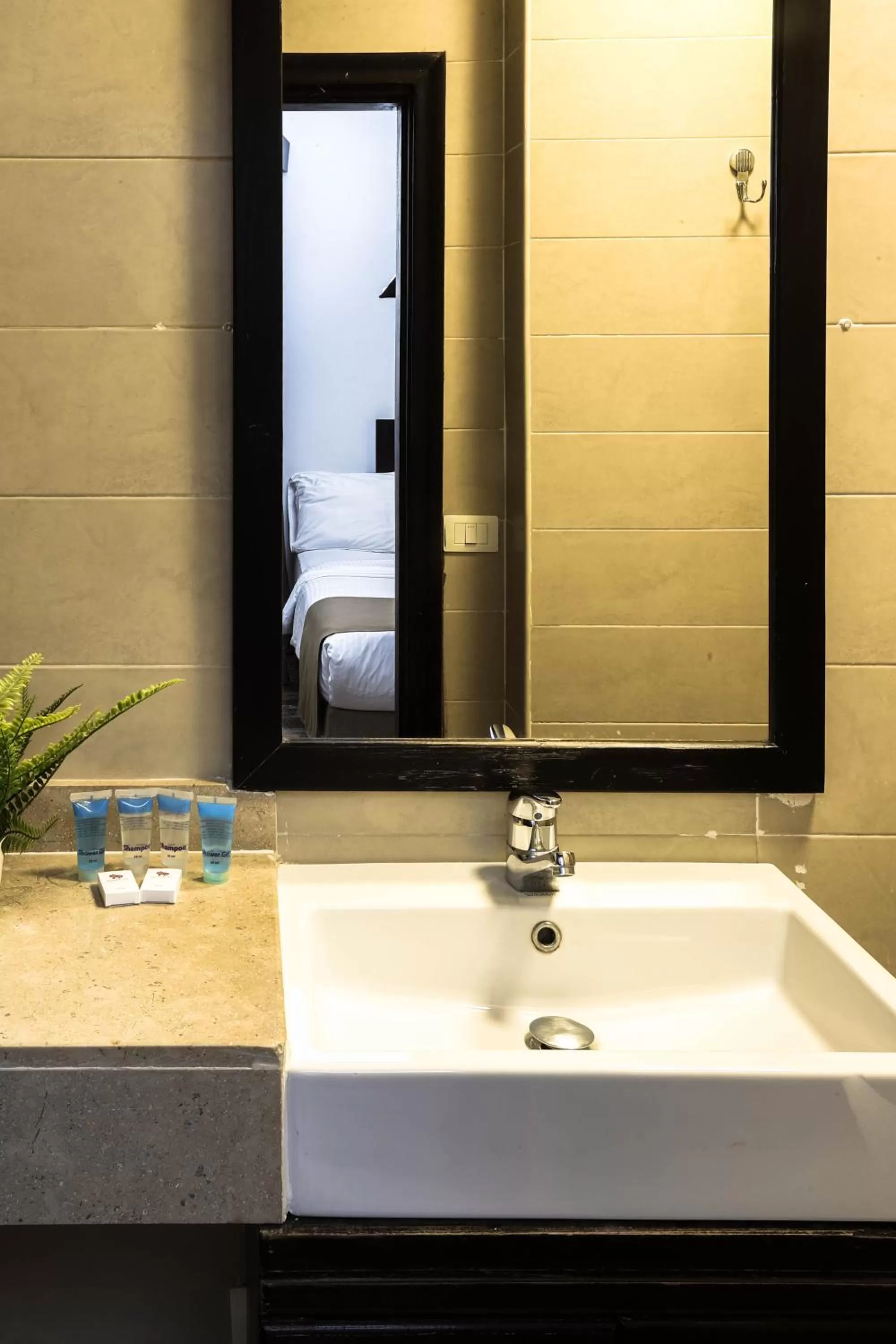 Bathroom in NewCity Hotel & Suites