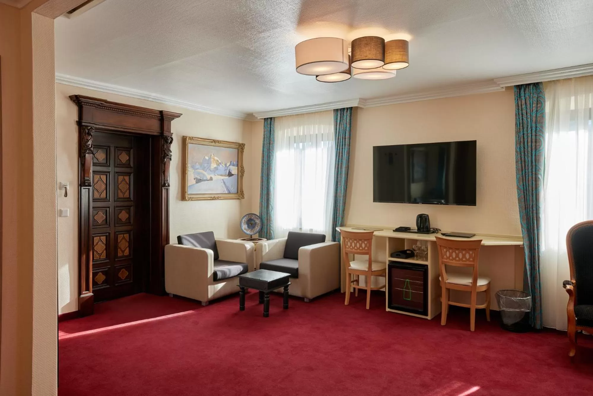 TV and multimedia, Seating Area in Atlas Posthotel