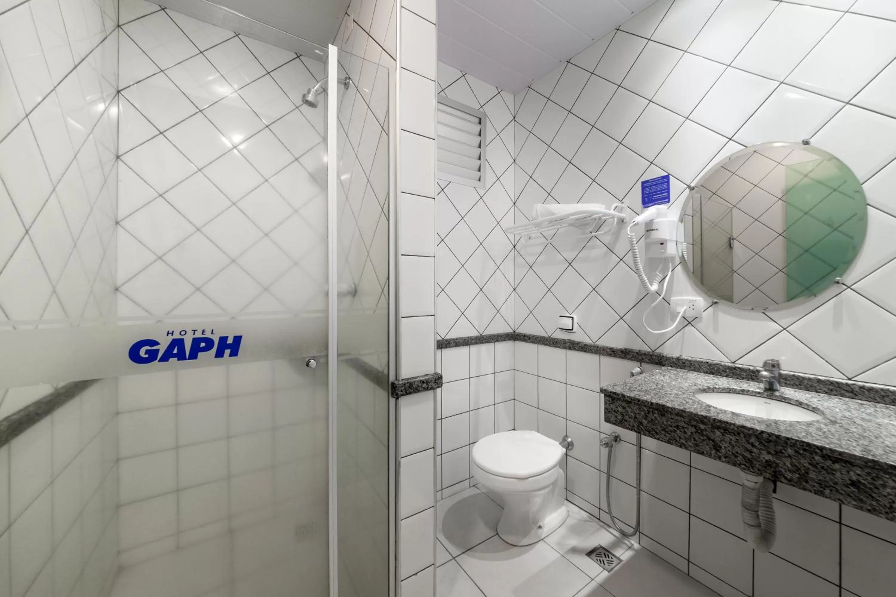 Bathroom in Hotel GAPH Maringa - Economico Mini Resort