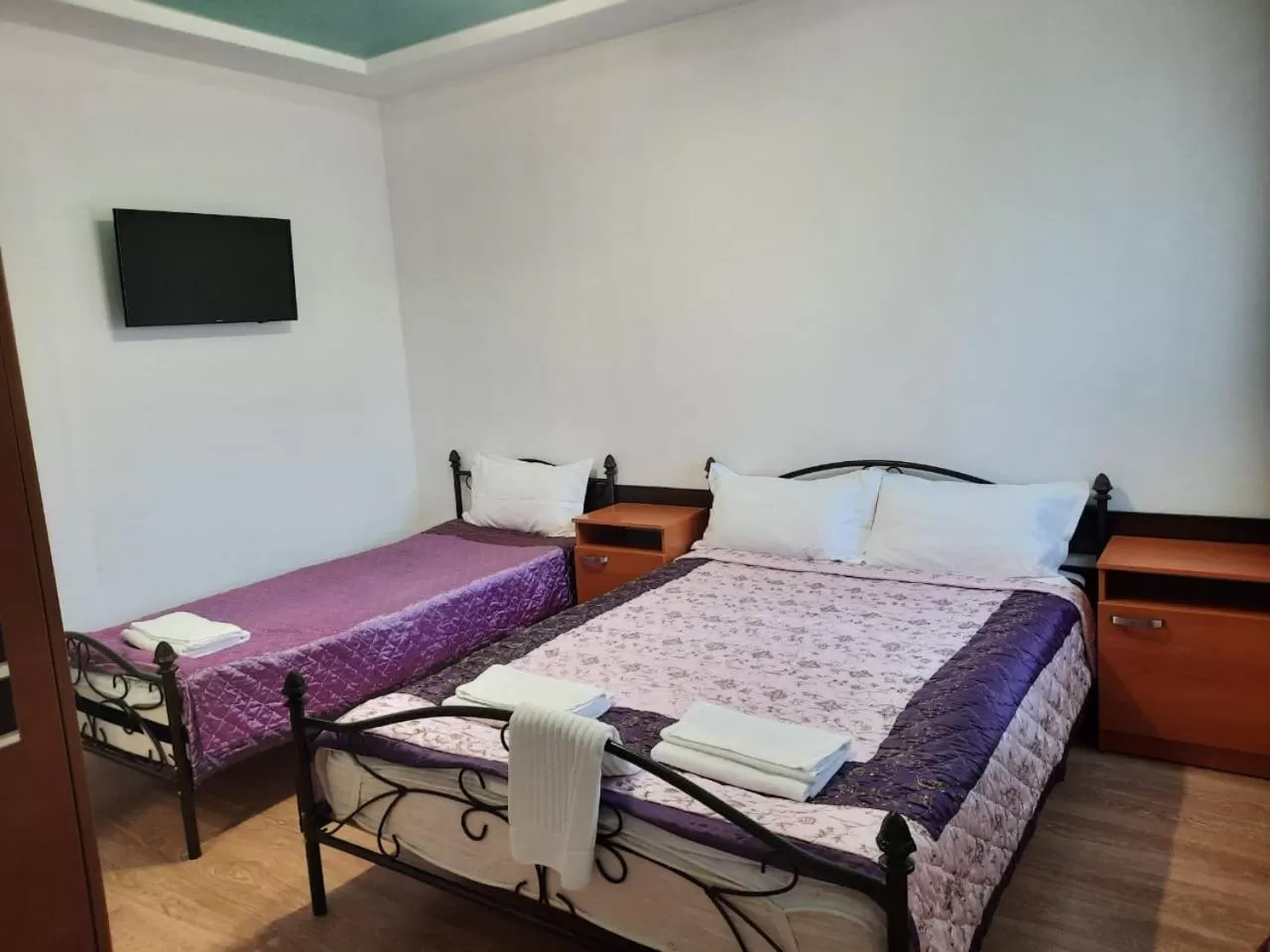 Bed in Zhaylau Hotel