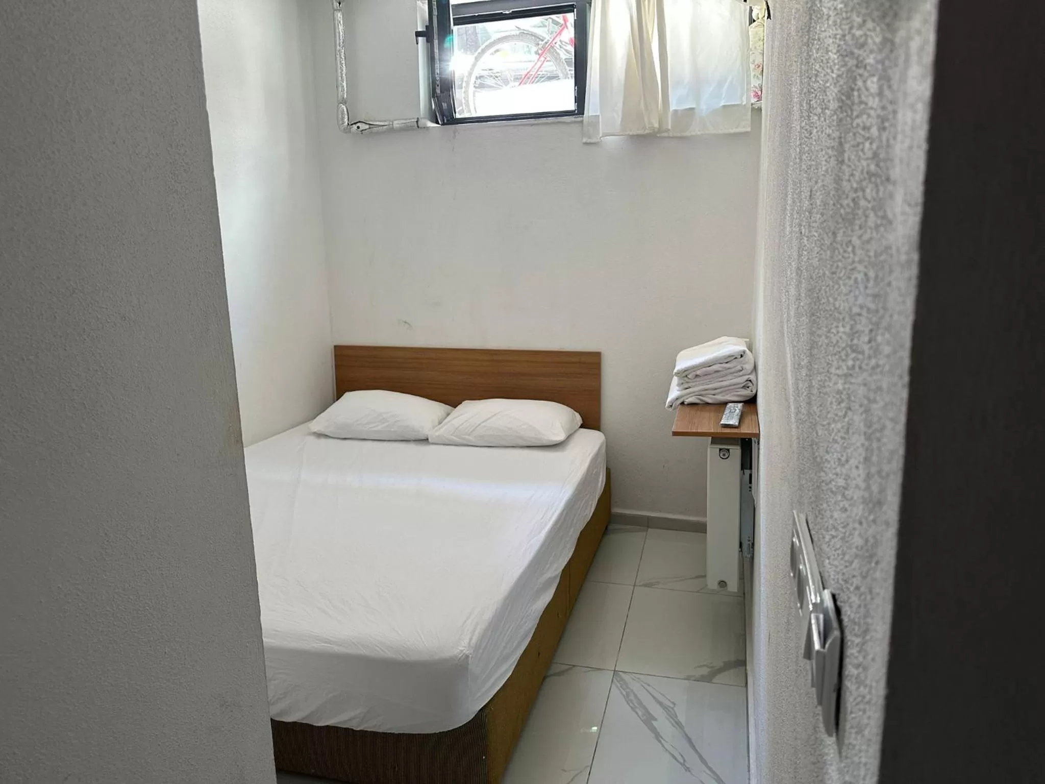 Photo of the whole room, Bed in NR1 HOTEL