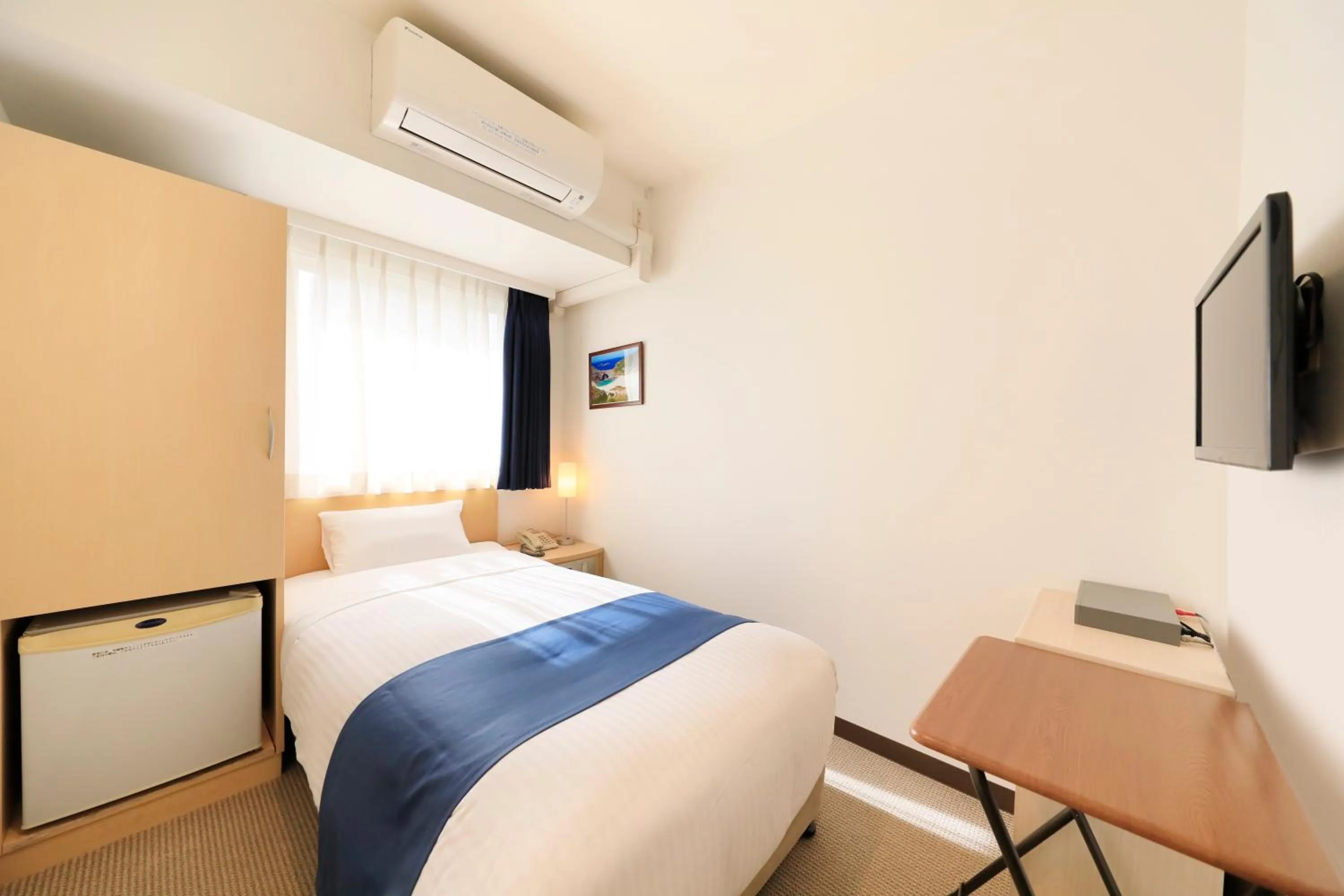 Photo of the whole room, Bed in Hotel Famy Inn Kinshicho