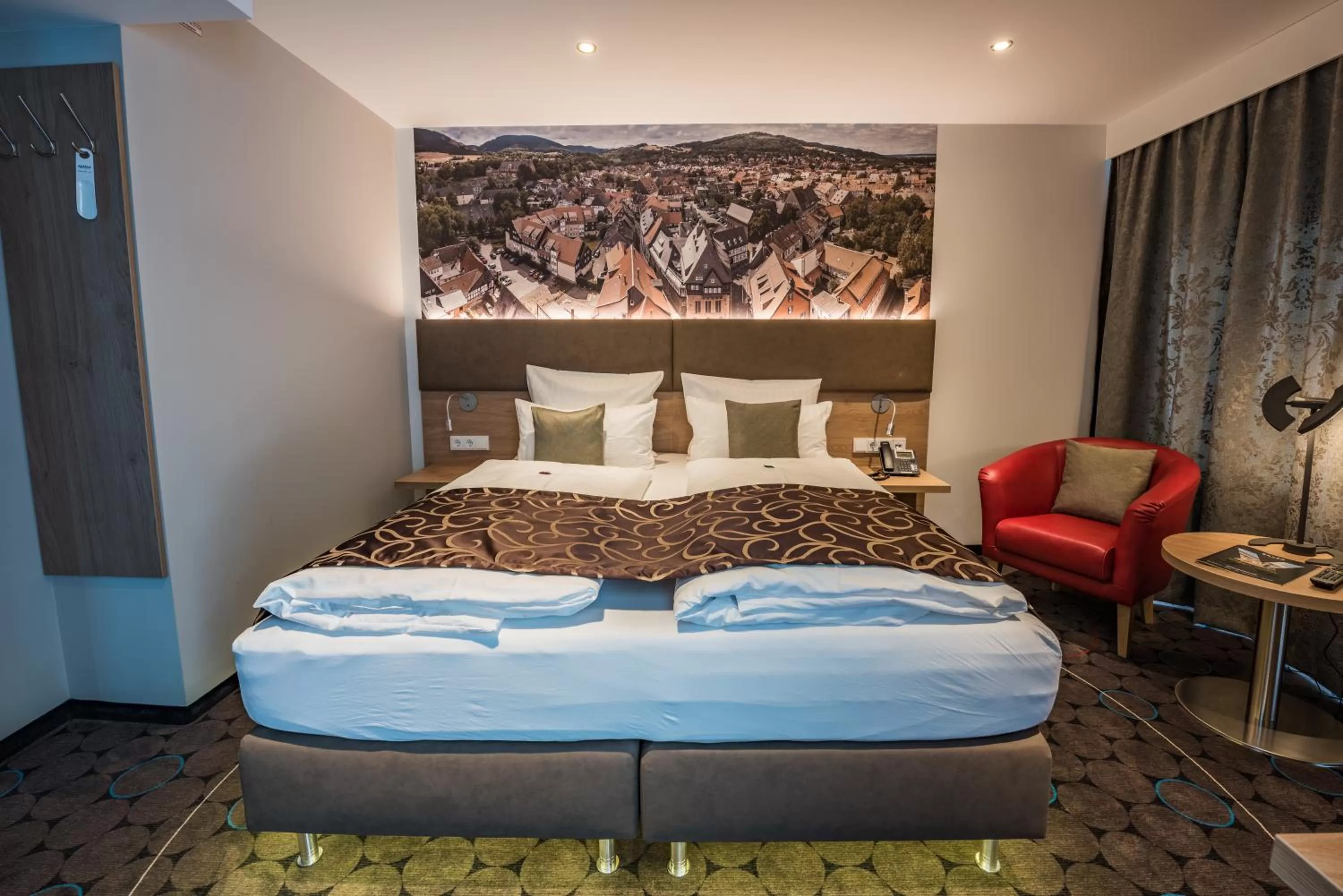 Photo of the whole room, Bed in AKZENT Hotel Villa Saxer