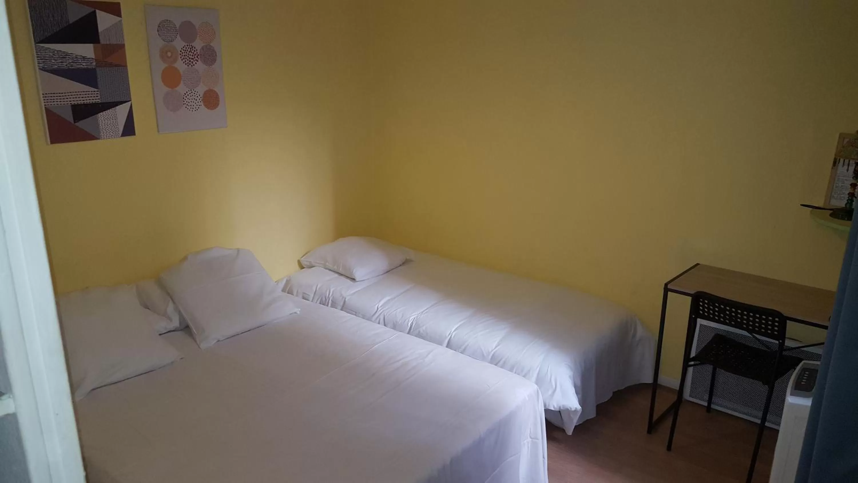 Bed in Hôtel Confort