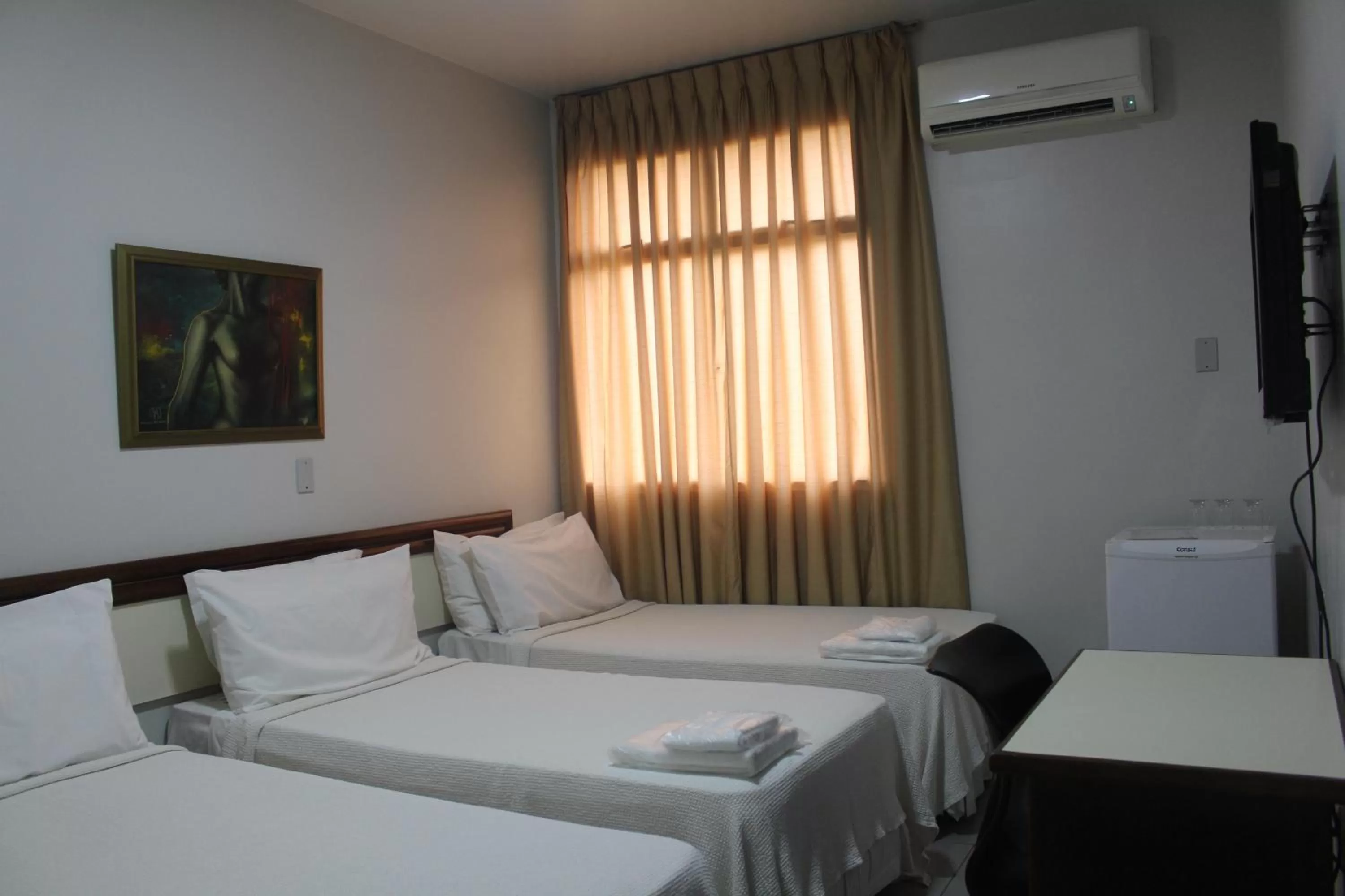 Bed in Hotel Oscar Econômico