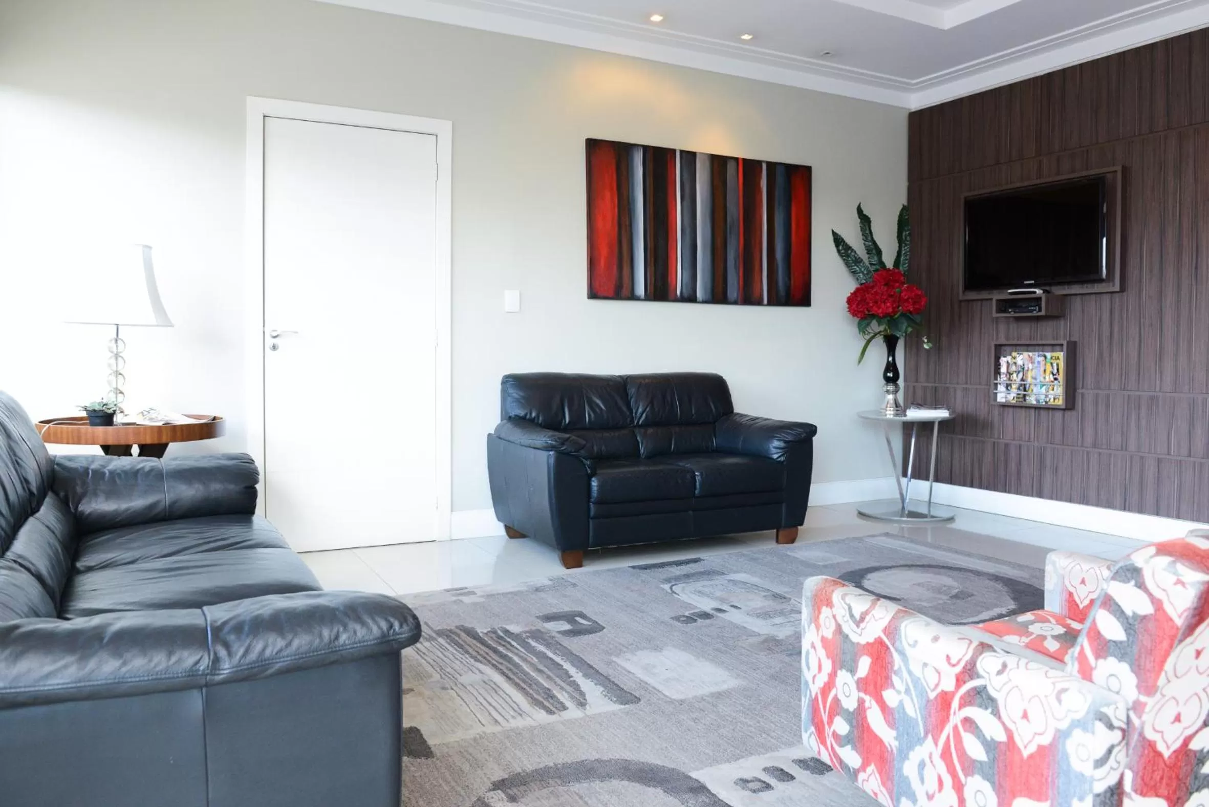 Communal lounge/ TV room, Seating Area in Alano Executivo Hotel