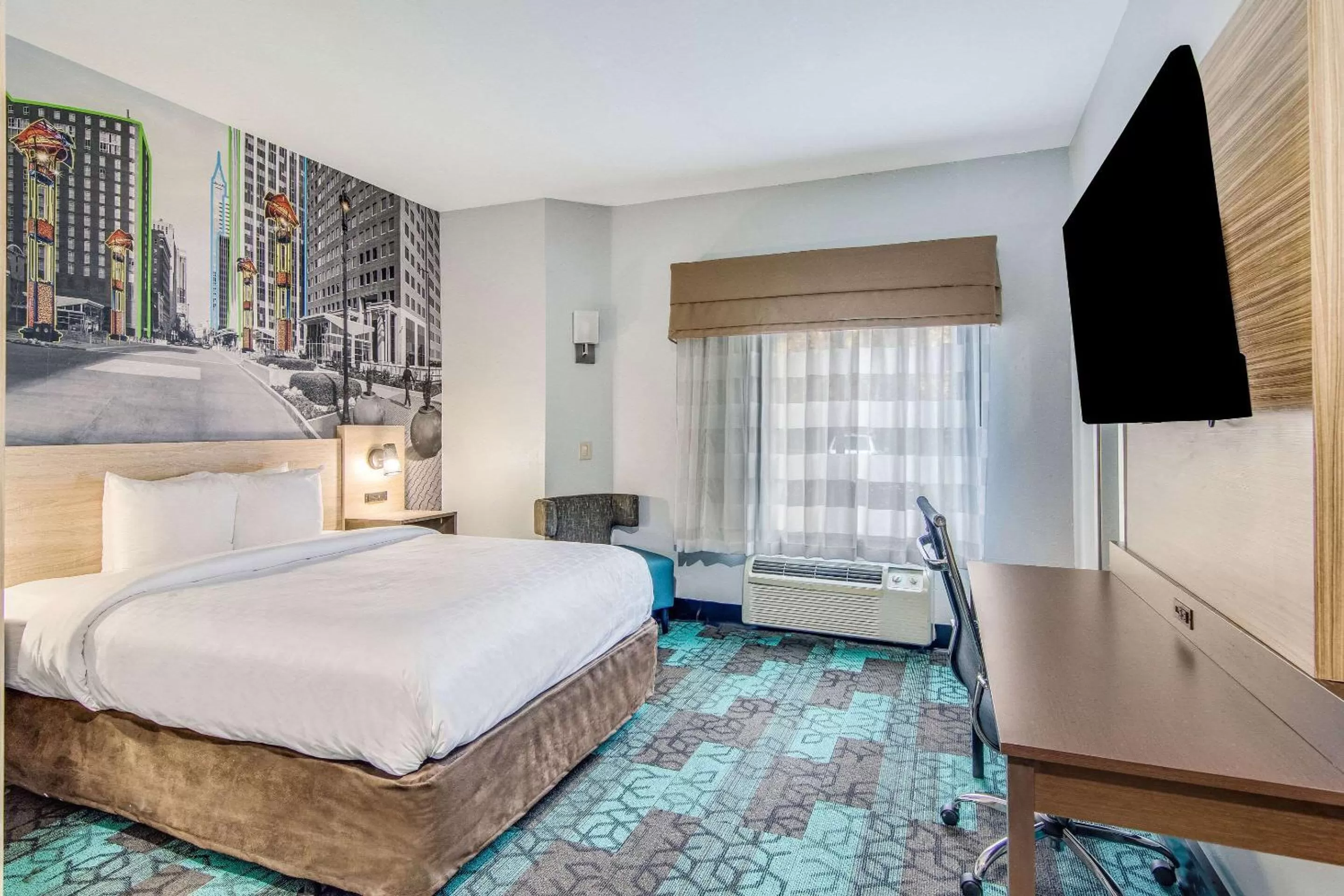 Photo of the whole room, Bed in Clarion Pointe Wake Forest - Raleigh North