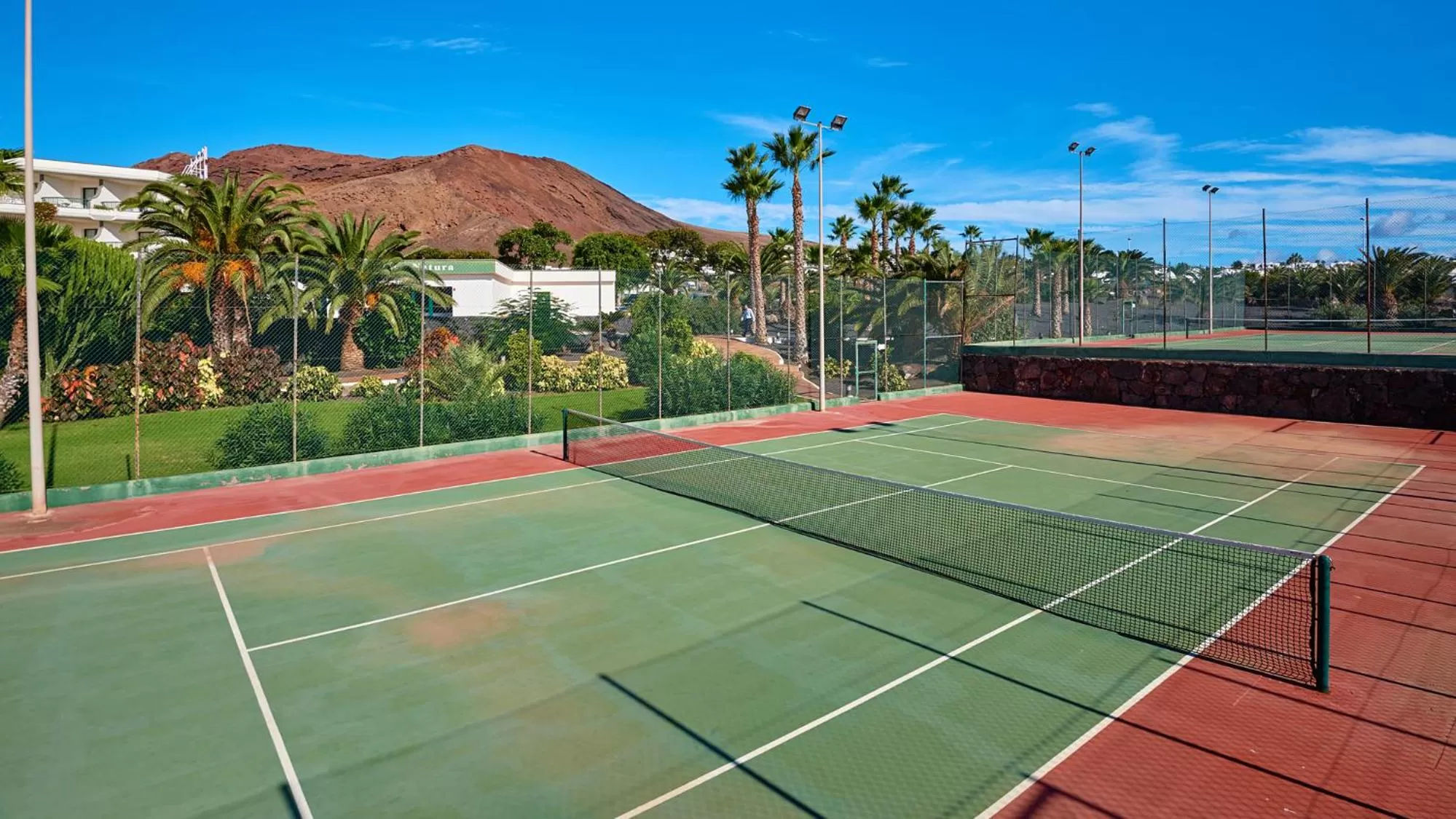 Tennis court in Hipotels Natura Palace Adults Only