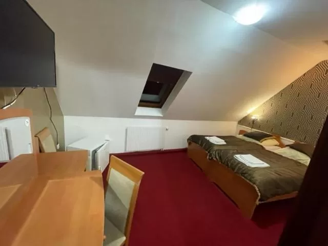 Bed in Hotel Minaret&Étterem