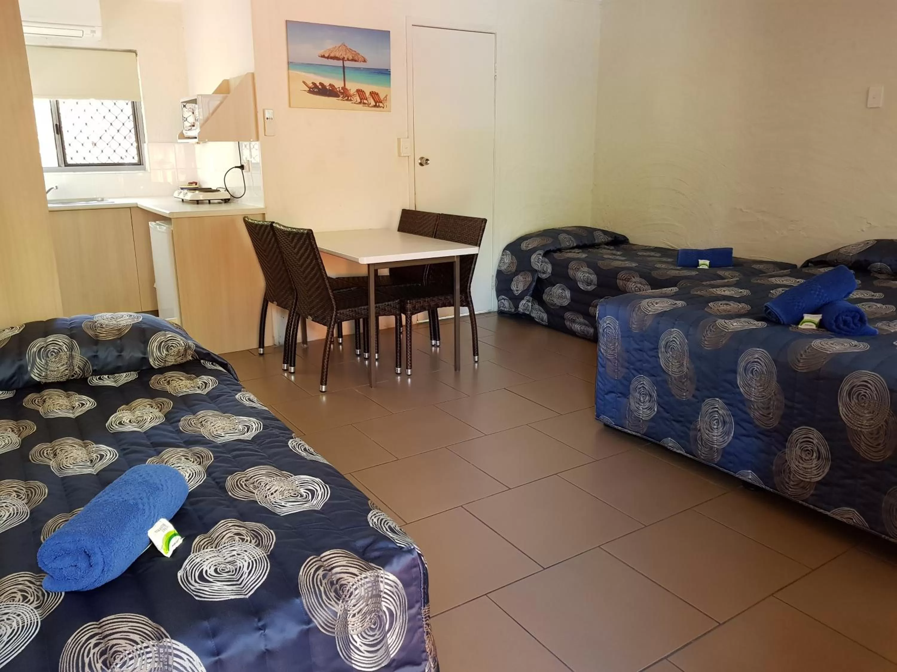 Photo of the whole room, Bed in Mango Tree Motel