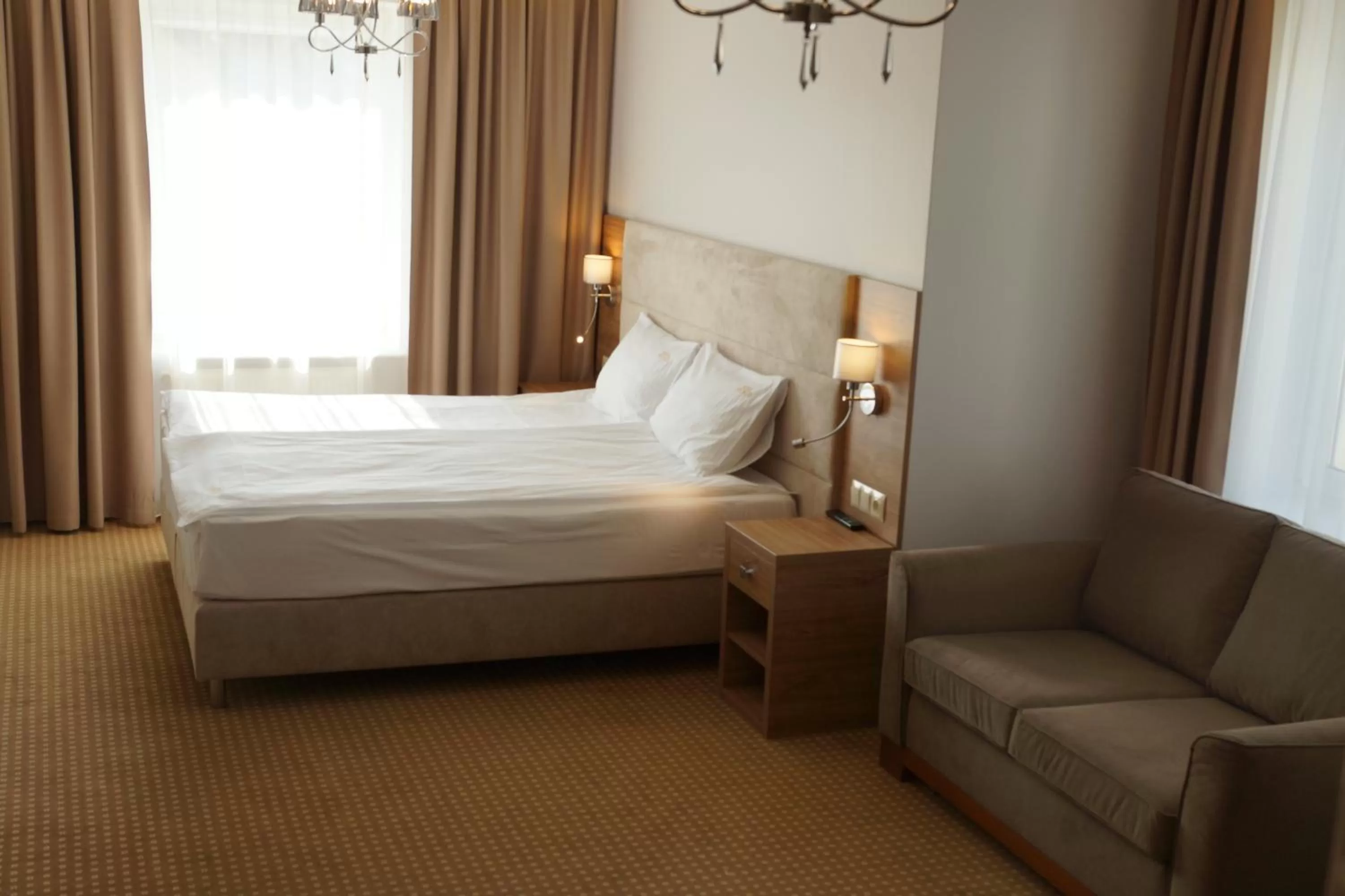 Bed in Moris Boutique Beach Hotel