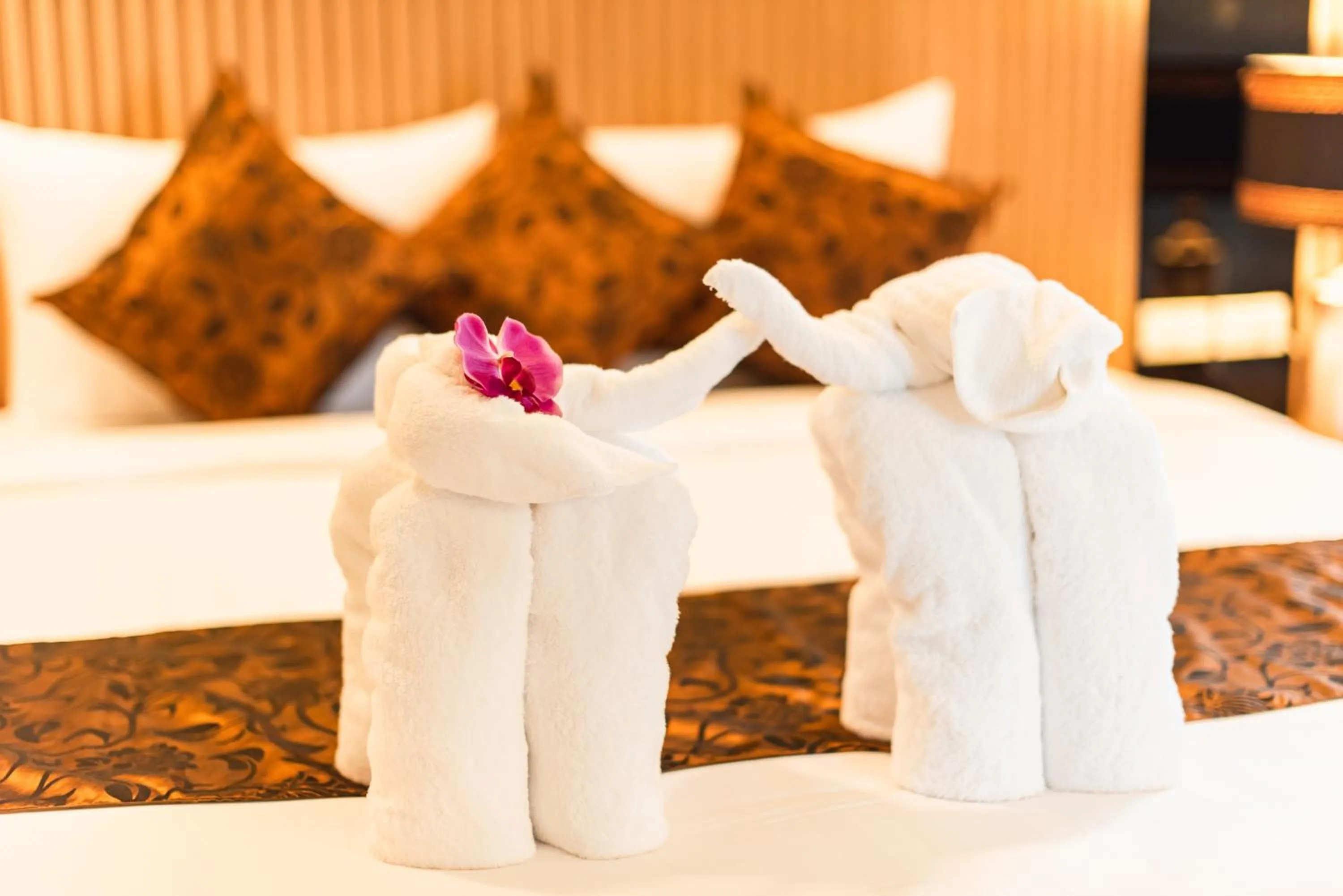 Bed in The Golden Ville Boutique Hotel and Spa