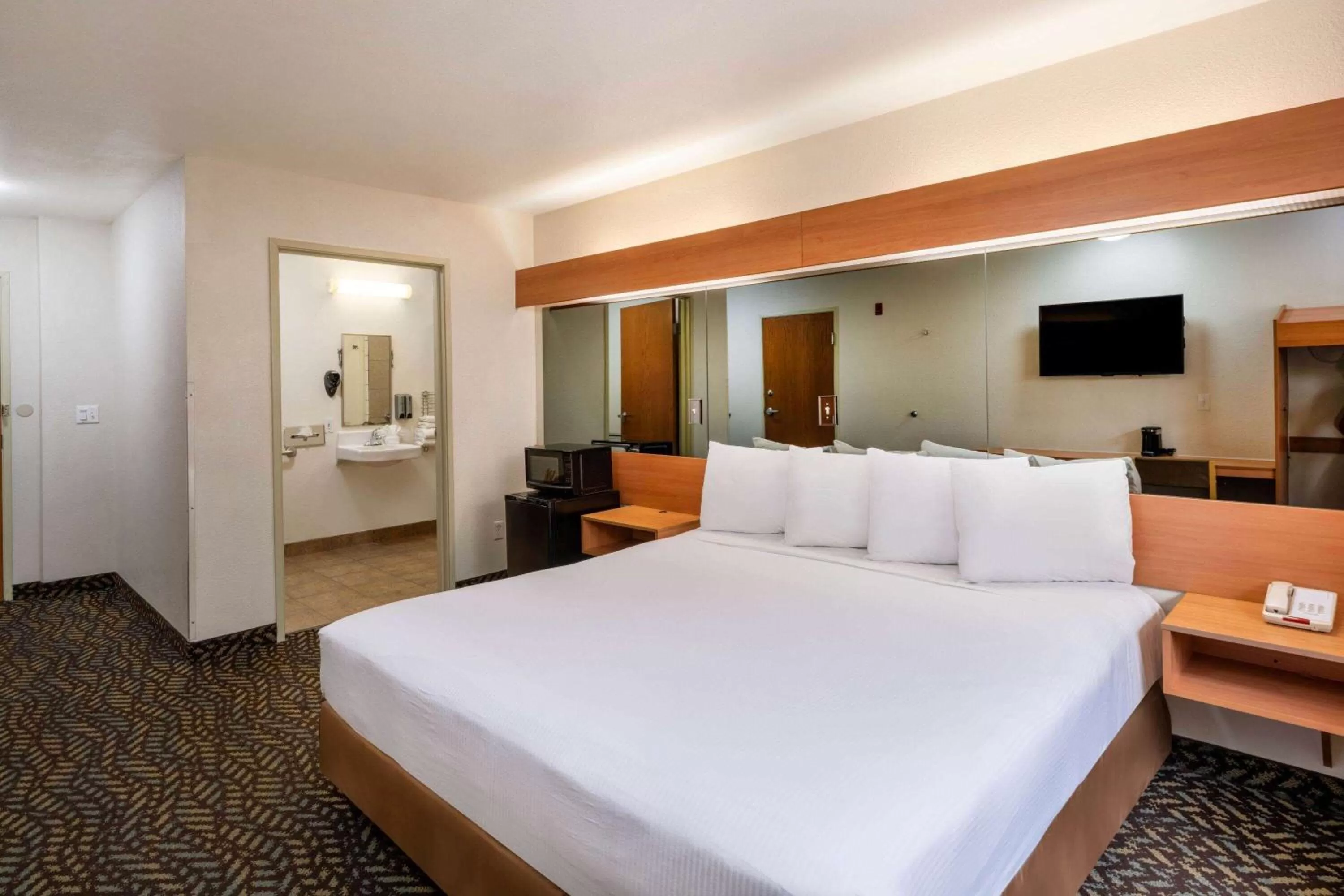 Photo of the whole room, Bed in Microtel Inn & Suites by Wyndham Salt Lake City Airport