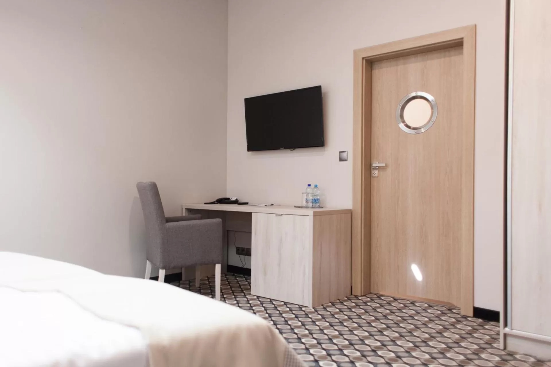 TV/Entertainment Center in Hotel Restauracja Piwnica Rycerska