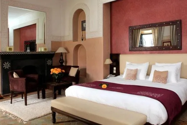 Photo of the whole room, Bed in Riad Monceau