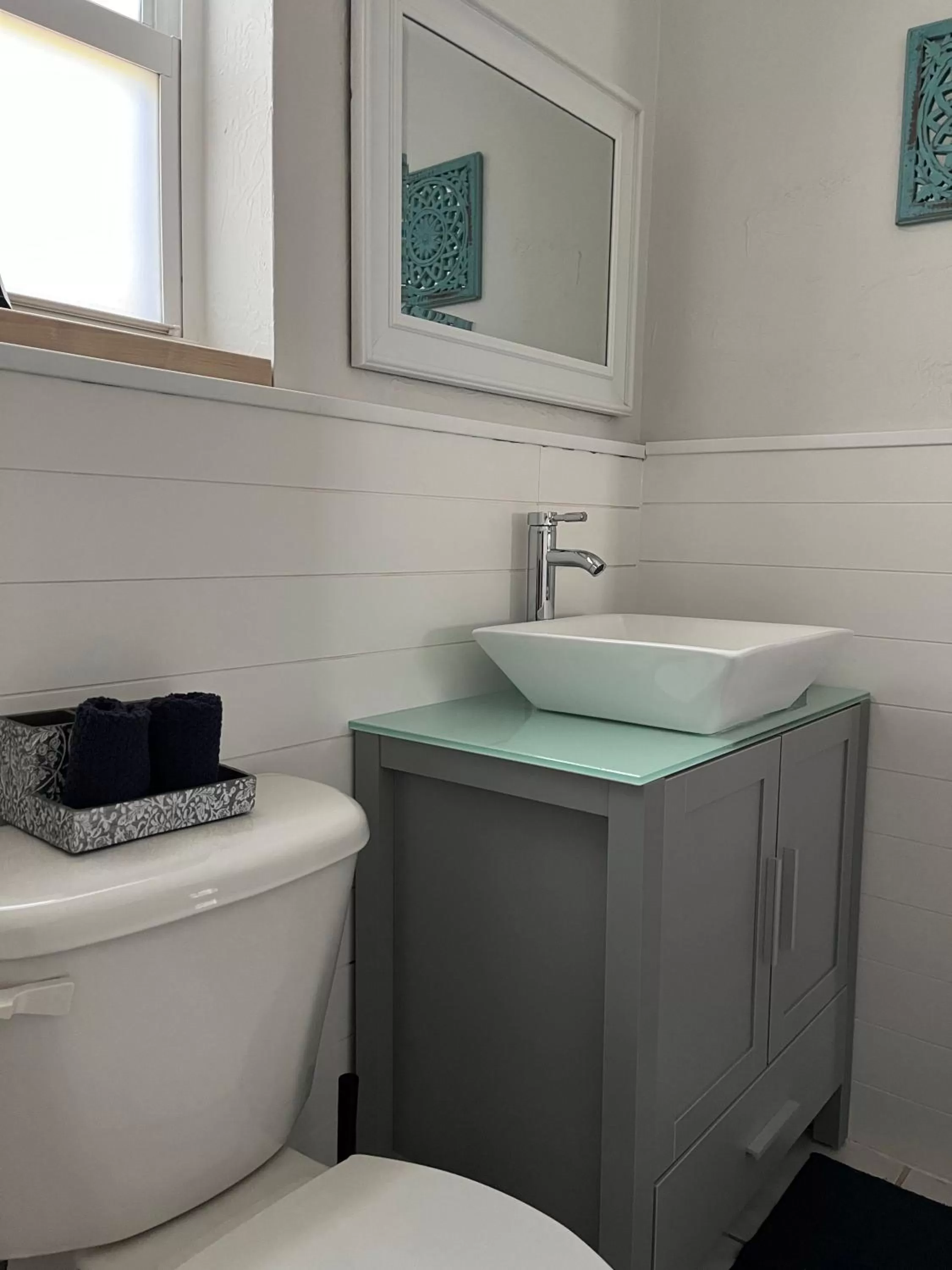 Bathroom in 4145 By The Sea Inn & Suites