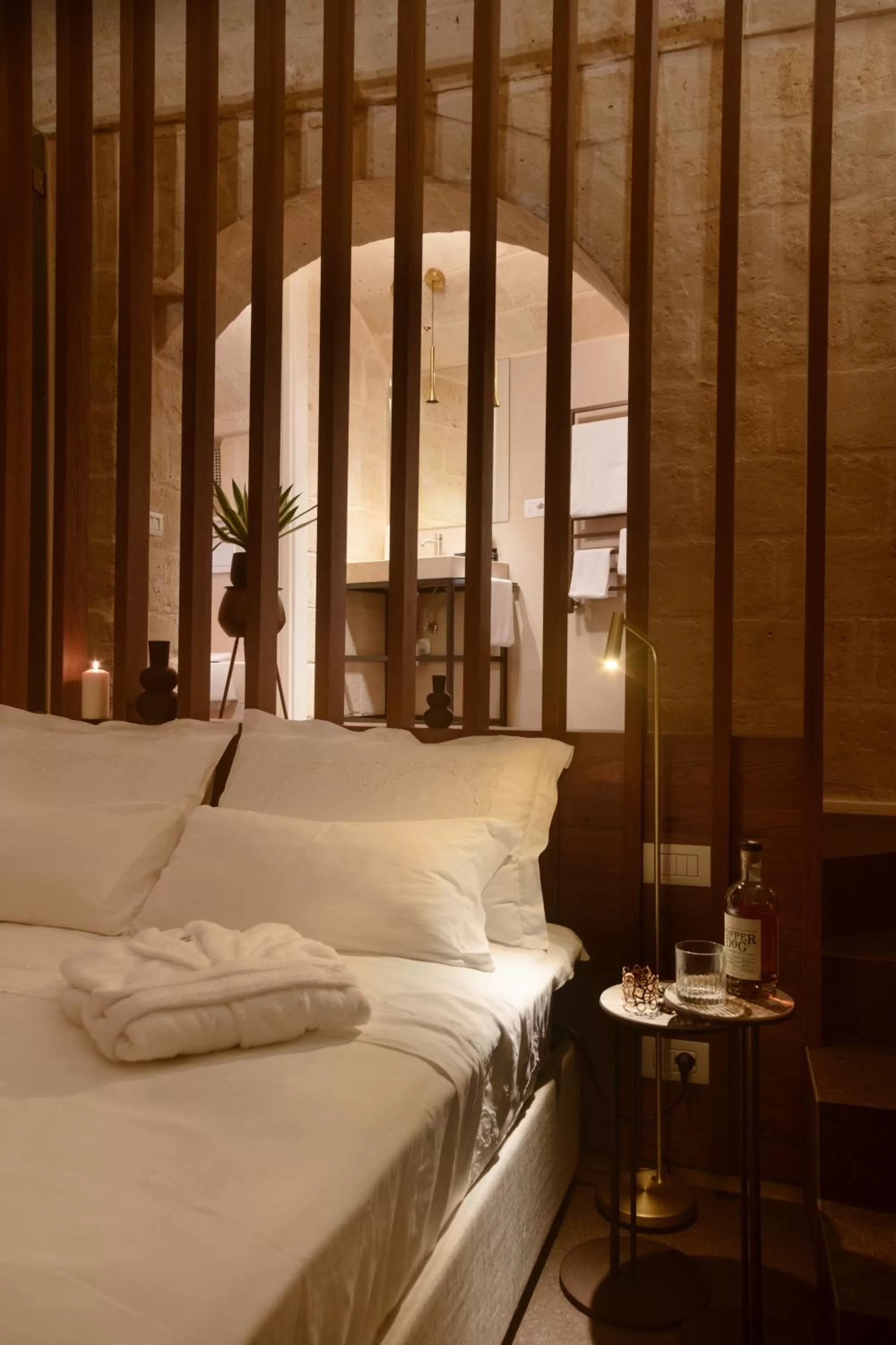 Bed in Le Malve Cave Retreat