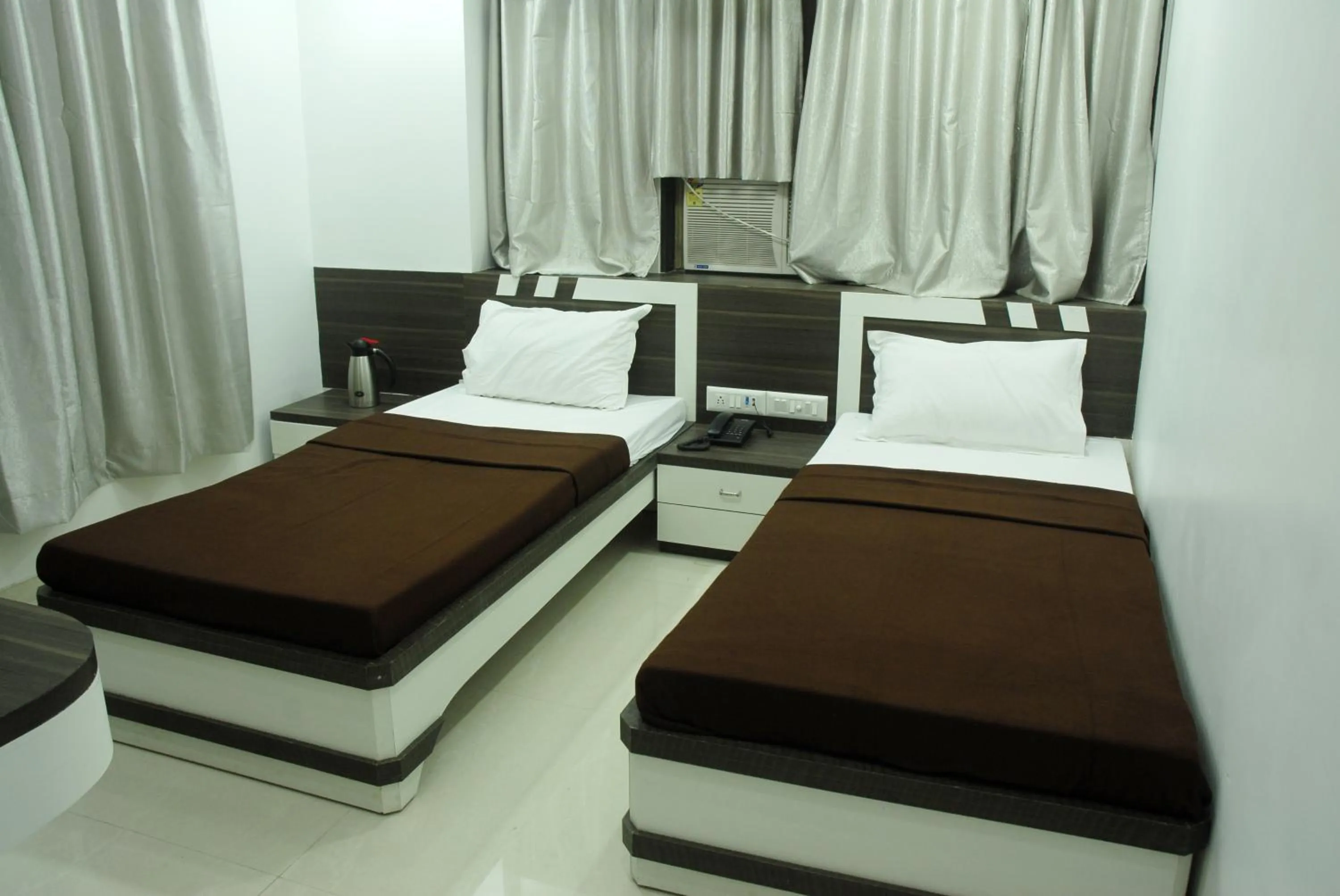 Bed in Hotel City View