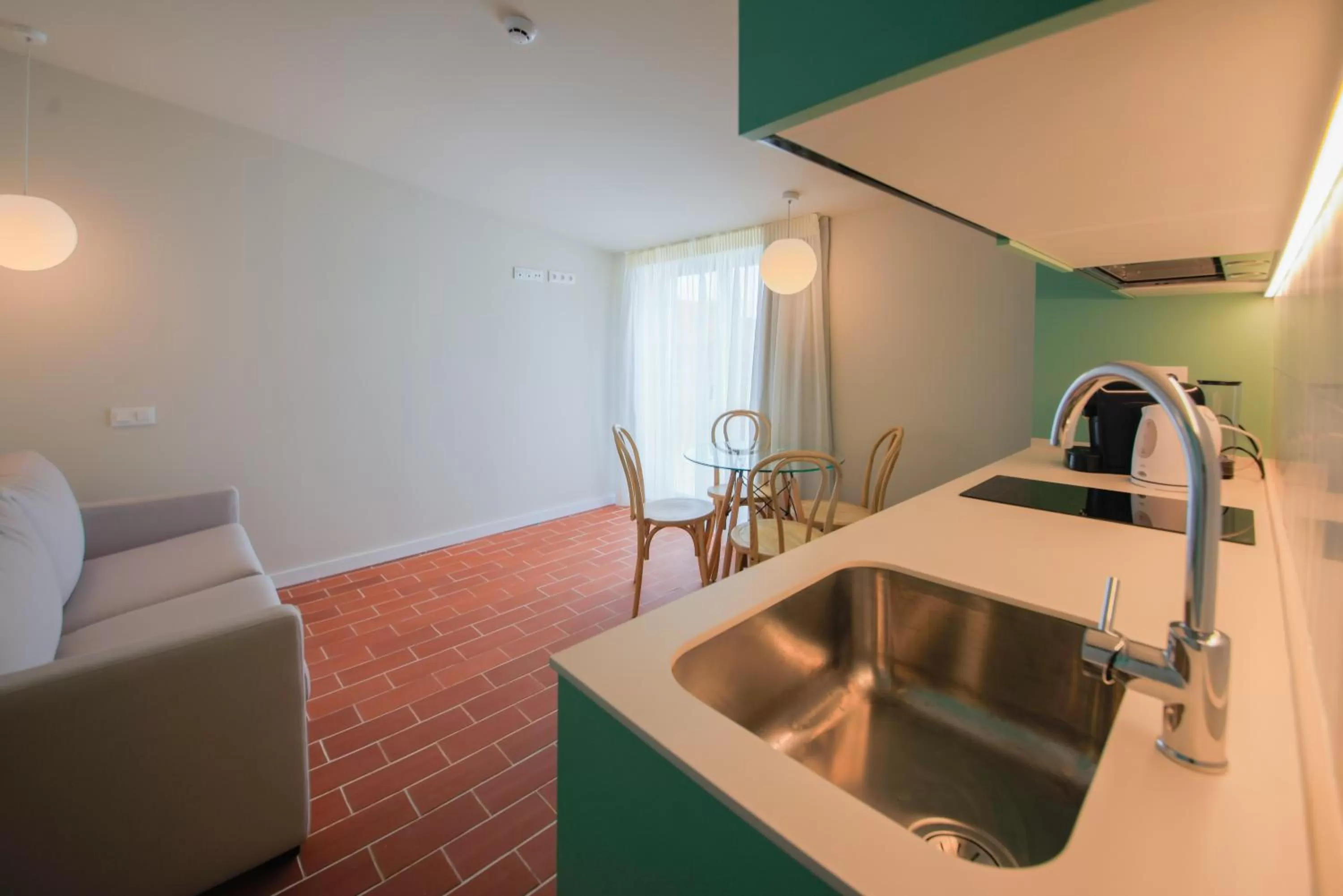 Kitchen or kitchenette in Terra Aurea Aparthotel
