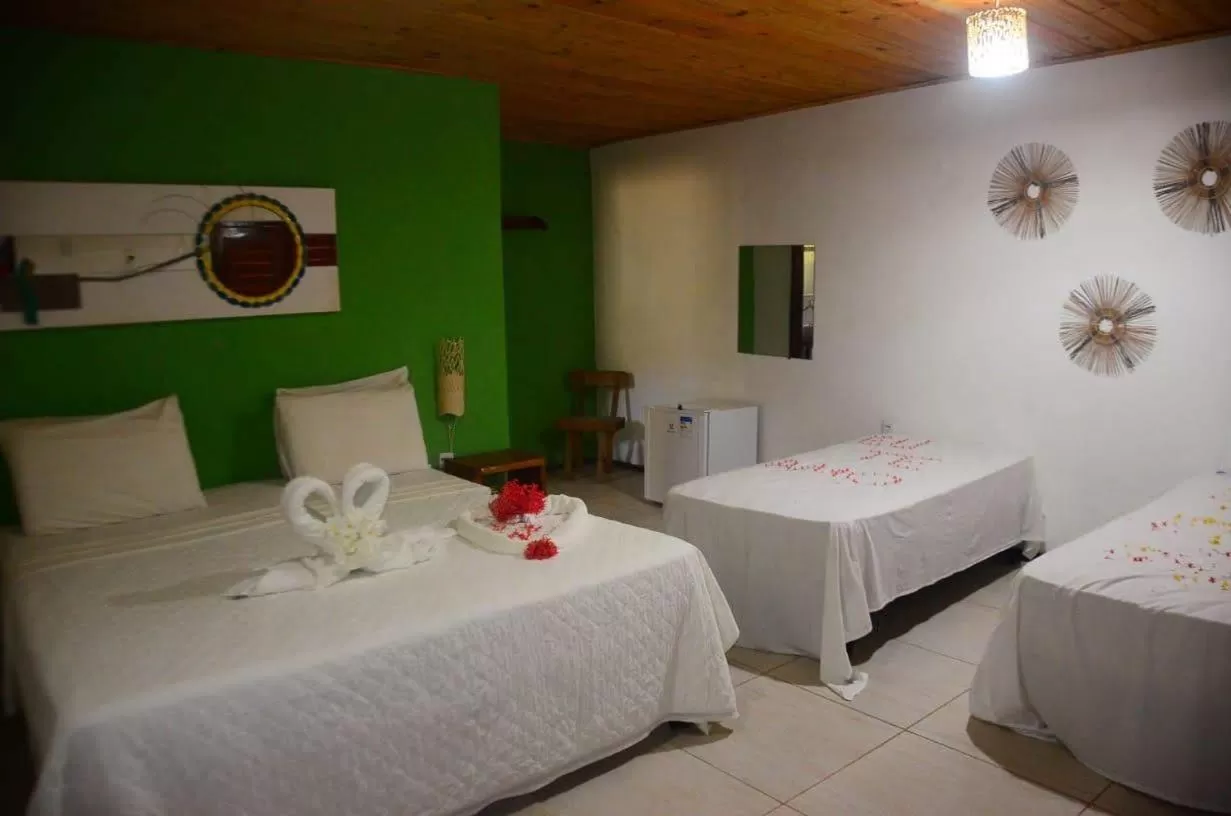Bed in Pousada e Restaurante Encanto das Águas