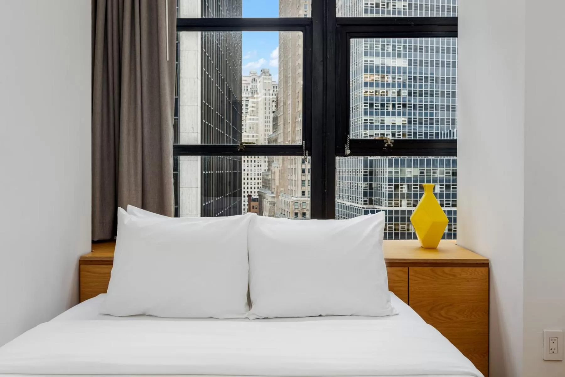 Bed in Placemakr Wall Street