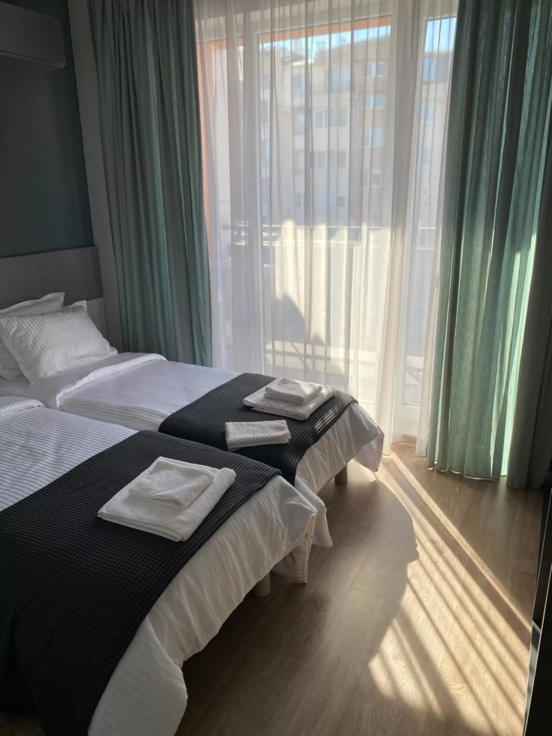 Bed in 7th Sense boutique apartments