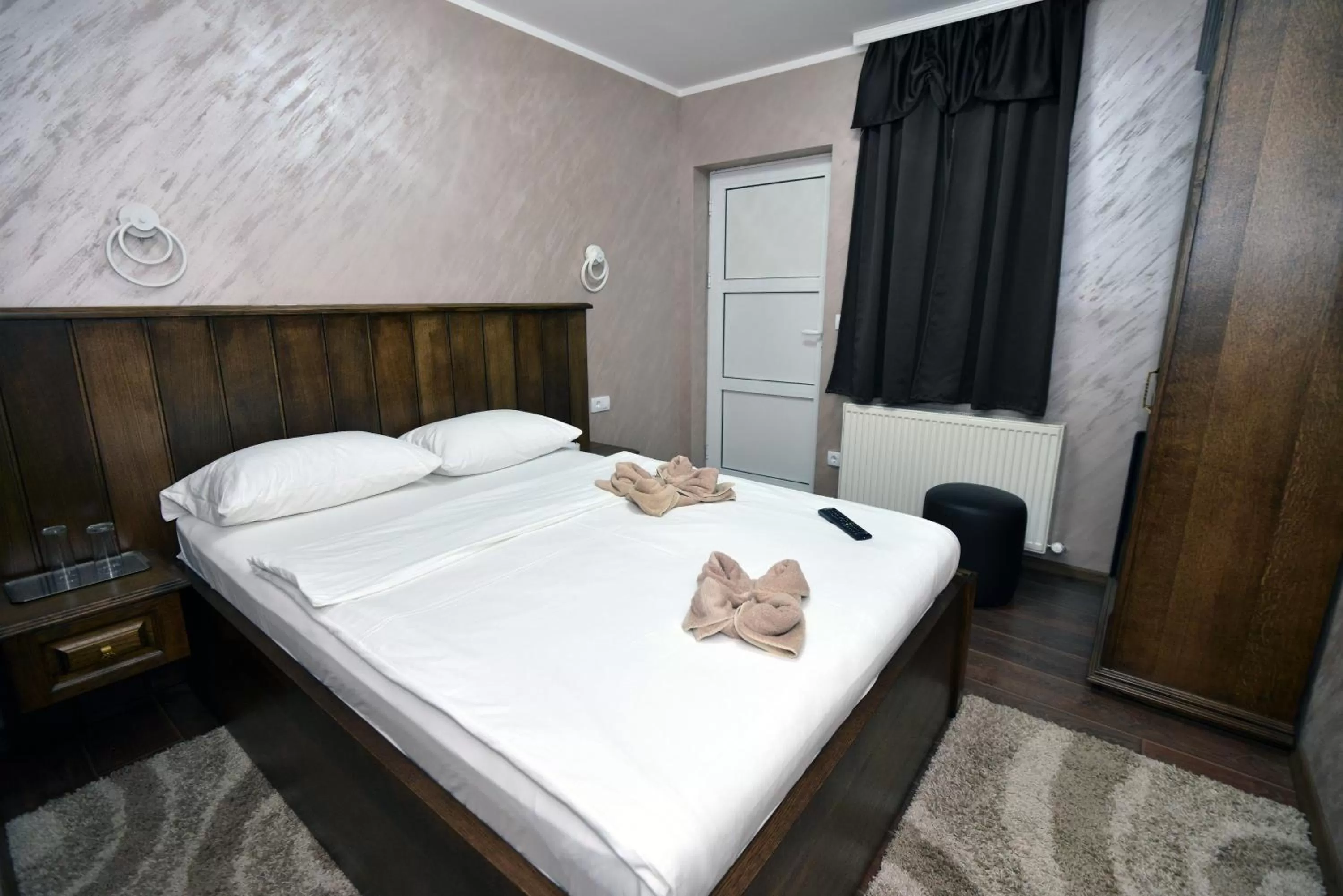 Bed in Garni Hotel Kaća