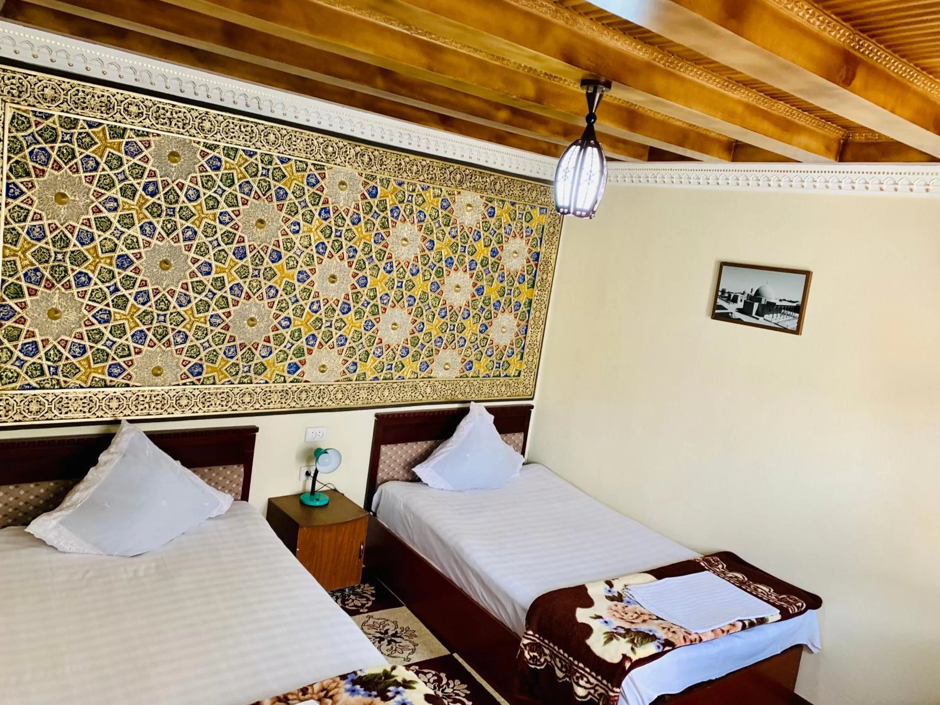 Bed in Sukhrob Barzu Hotel