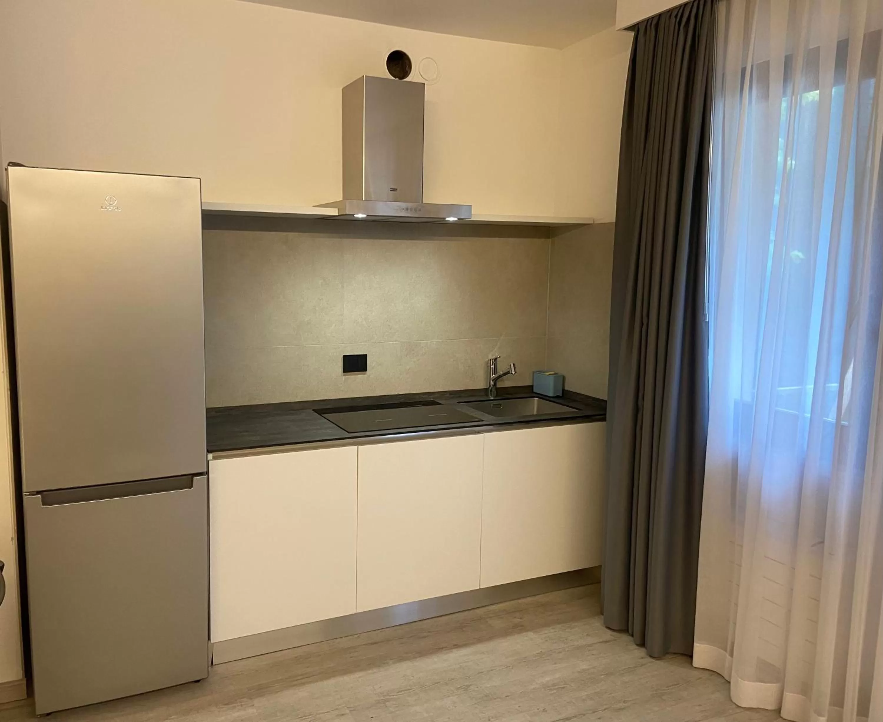 Kitchen or kitchenette in Corte Ongaro Hotel