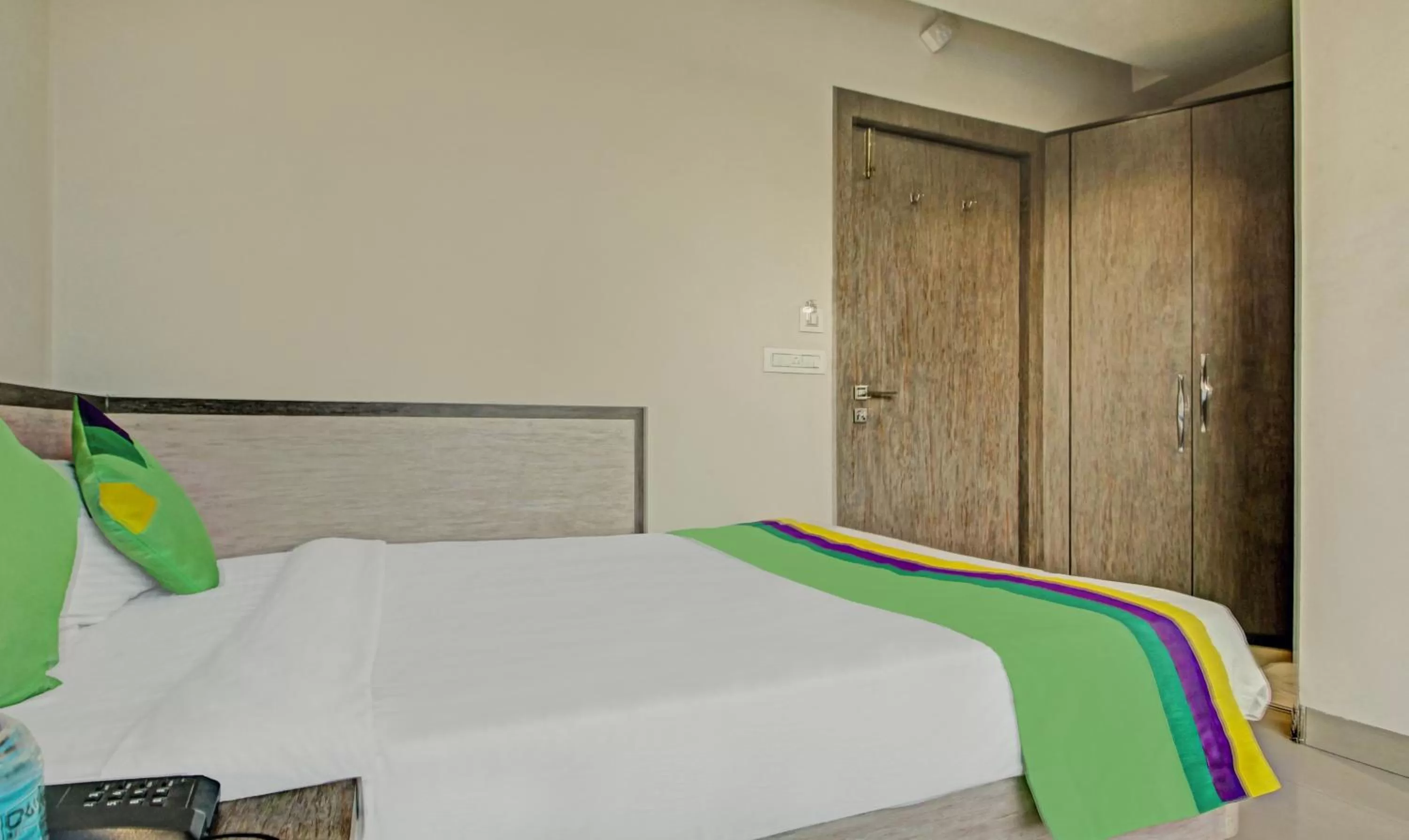 Bed in Treebo Trend Glassotel Ruby