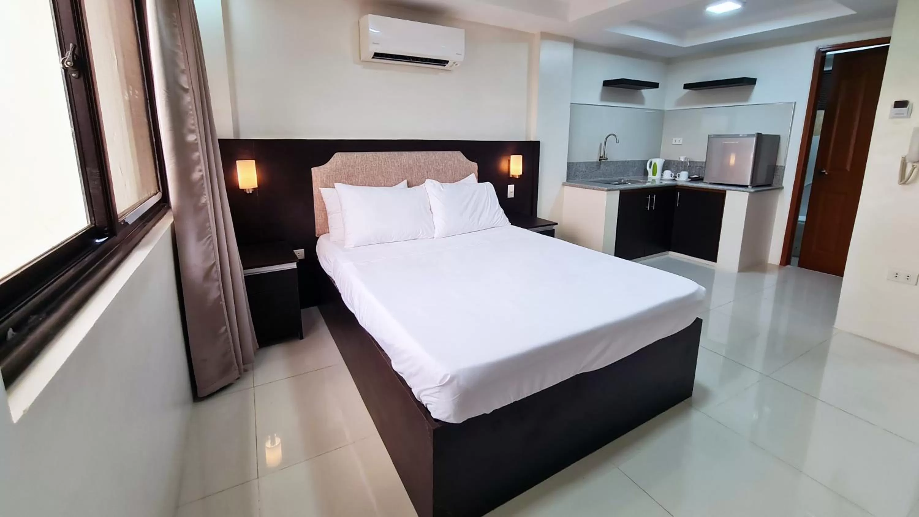 Bed in Staycation Hotel