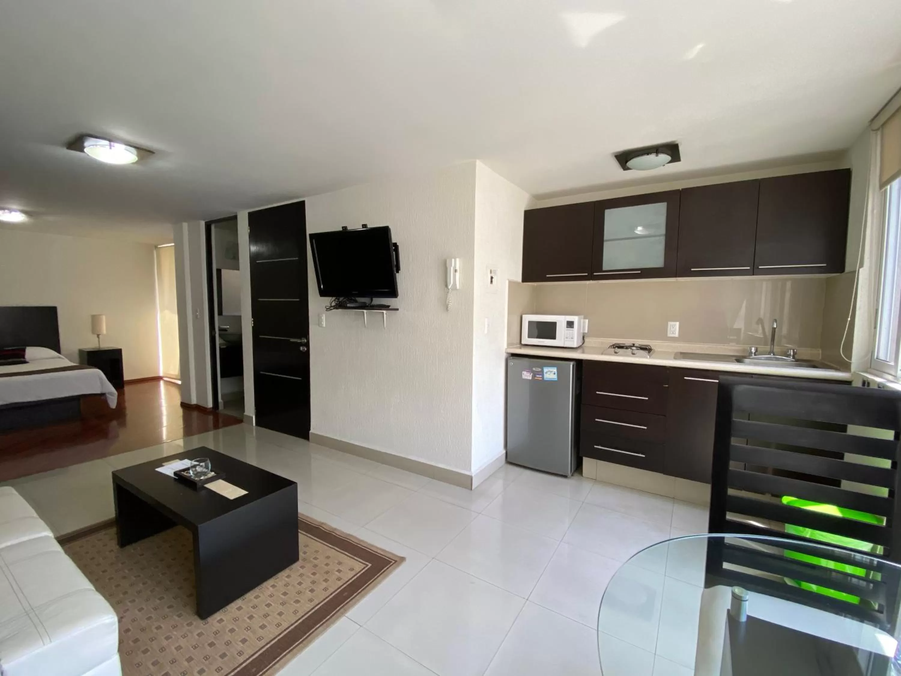 Kitchen or kitchenette, Bed in Grupo Kings Suites - Monte Chimborazo 567