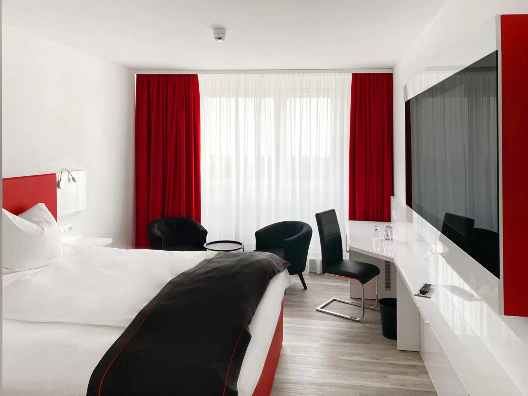 Photo of the whole room, Bed in DORMERO Hotel Darmstadt