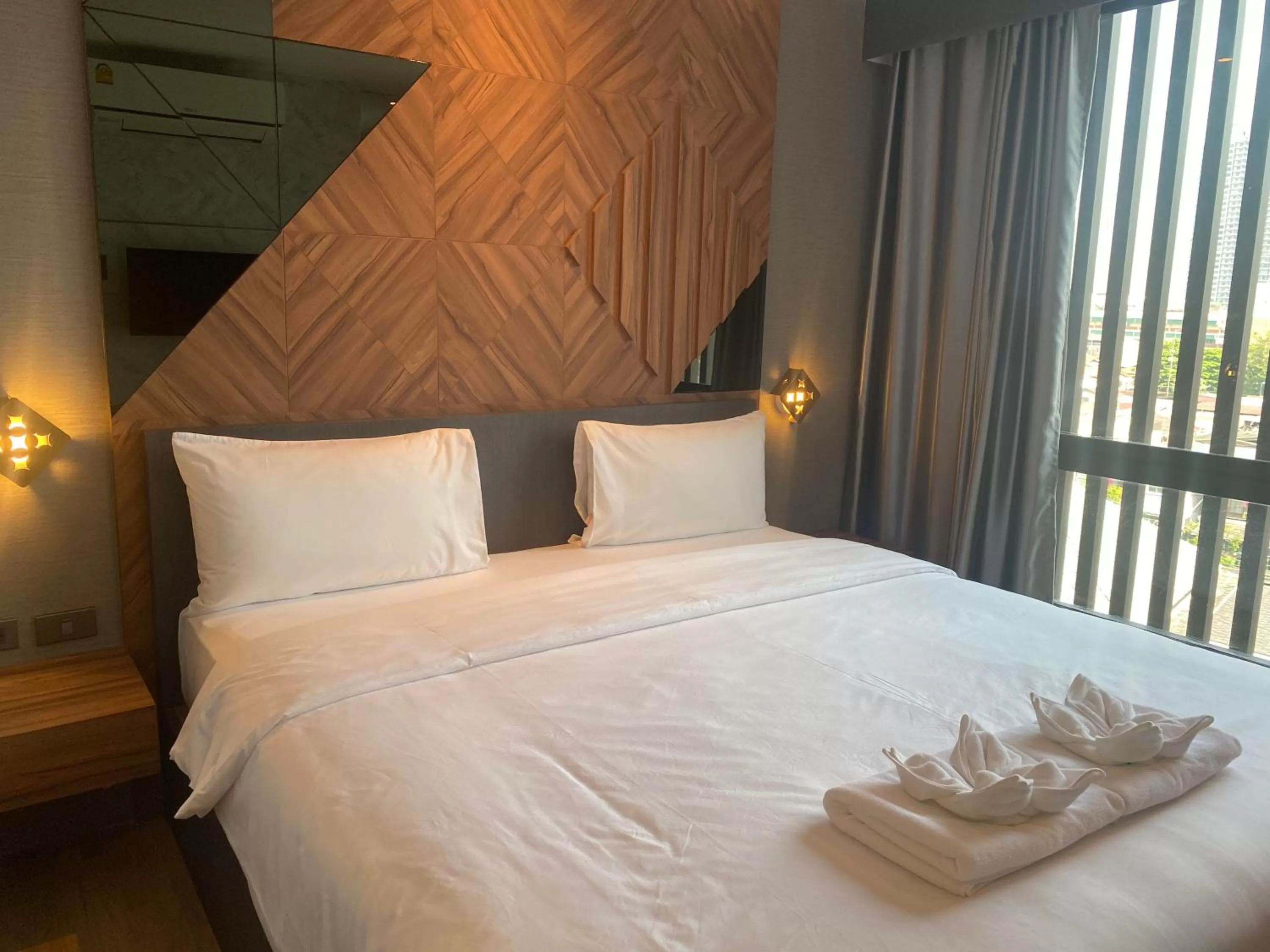 Bed in S3 Siam Bangkok Hotel