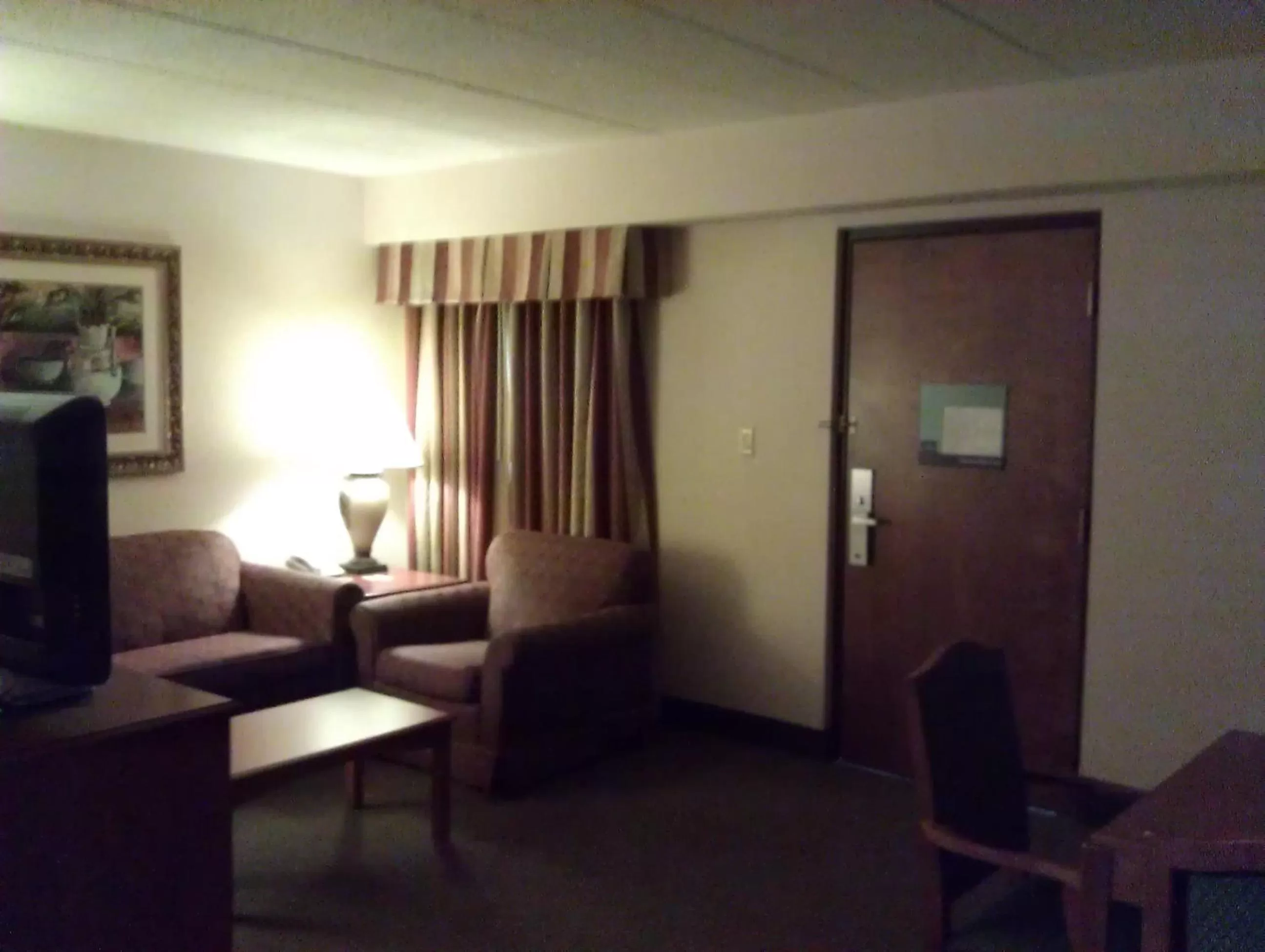 Seating area in AmericInn by Wyndham Omaha