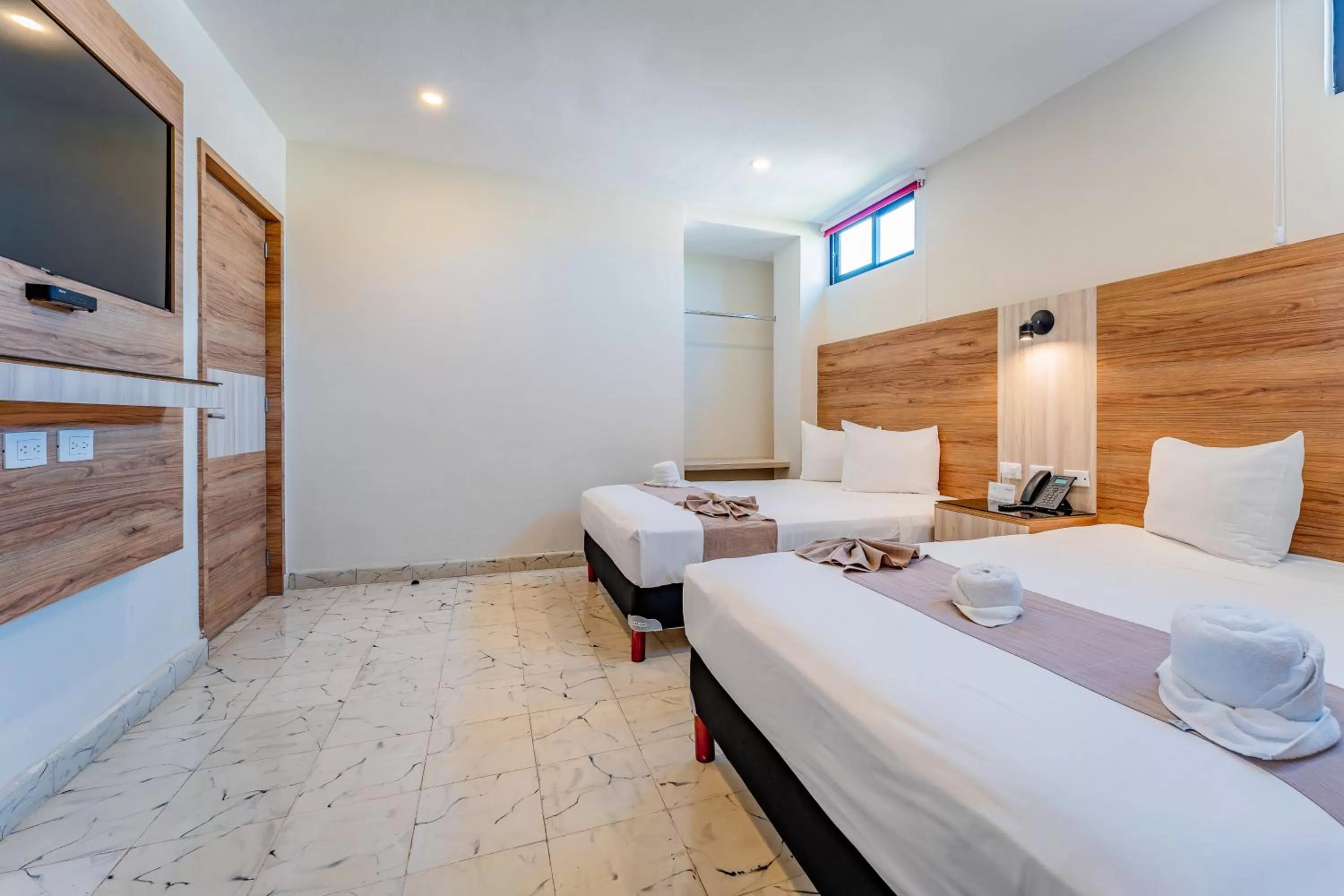 Photo of the whole room, Bed in Hotel Central Merida by Kavia