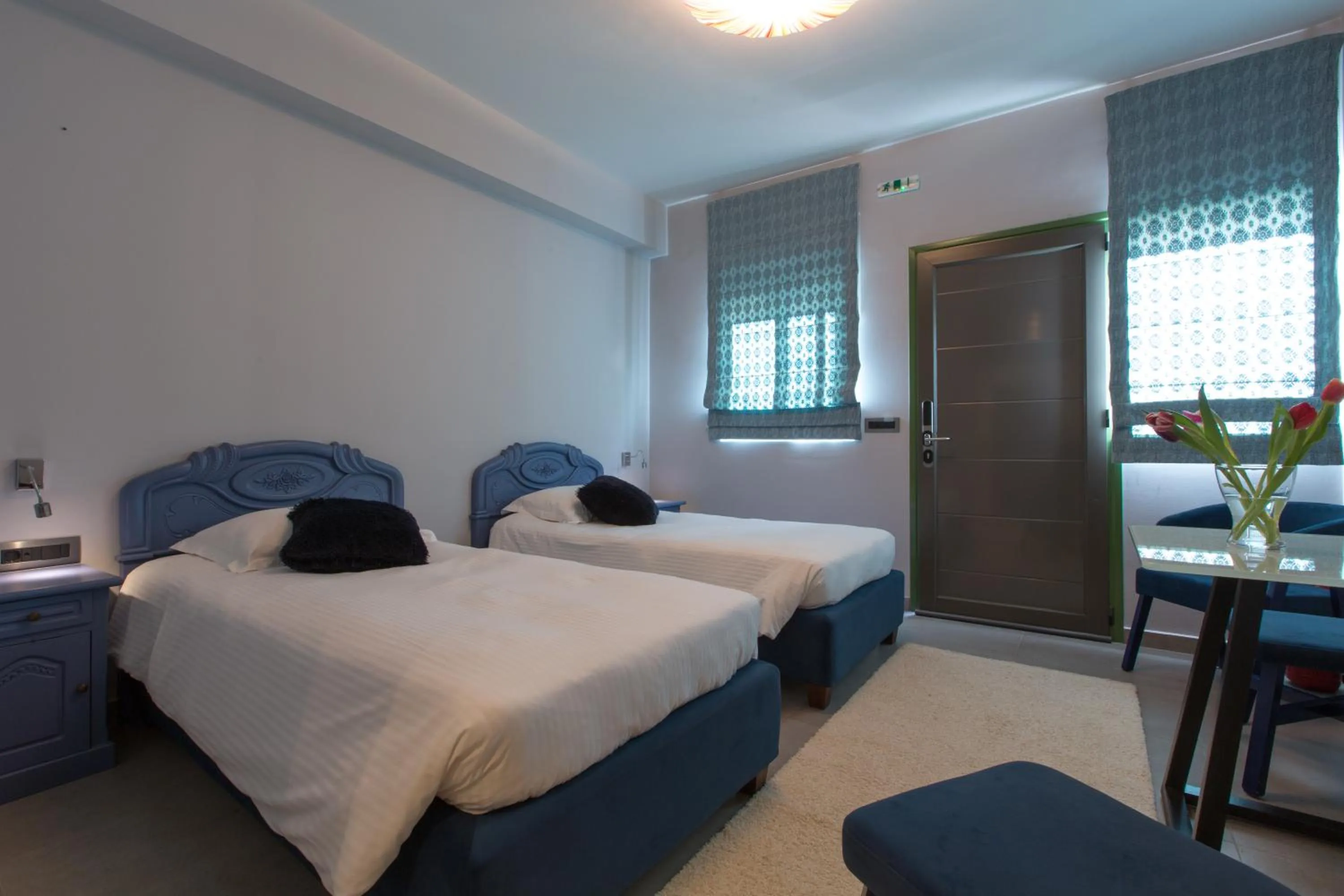 Bed in Anthemion Suites and Villas