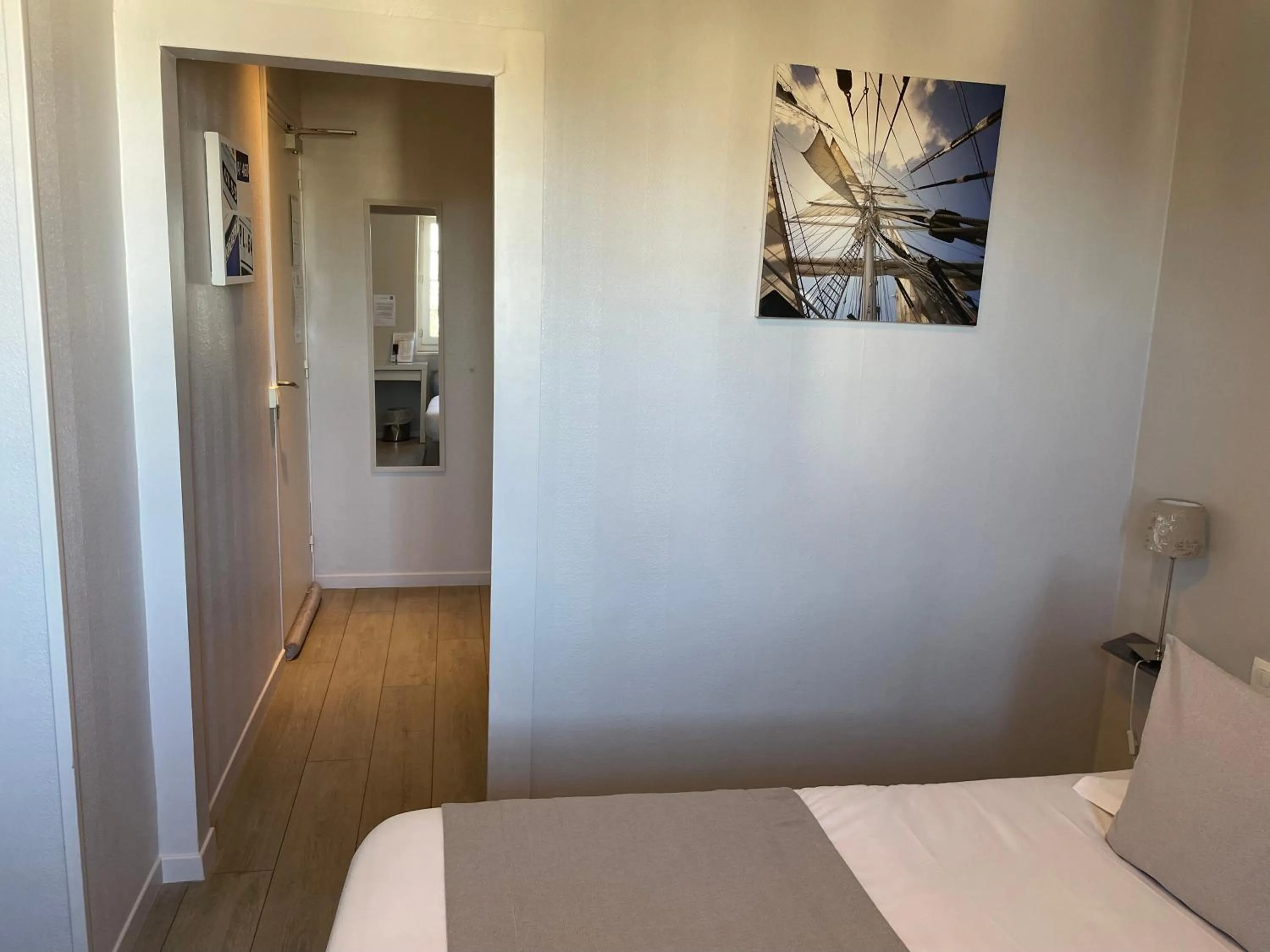 Photo of the whole room, Bed in Hôtel de la Plage