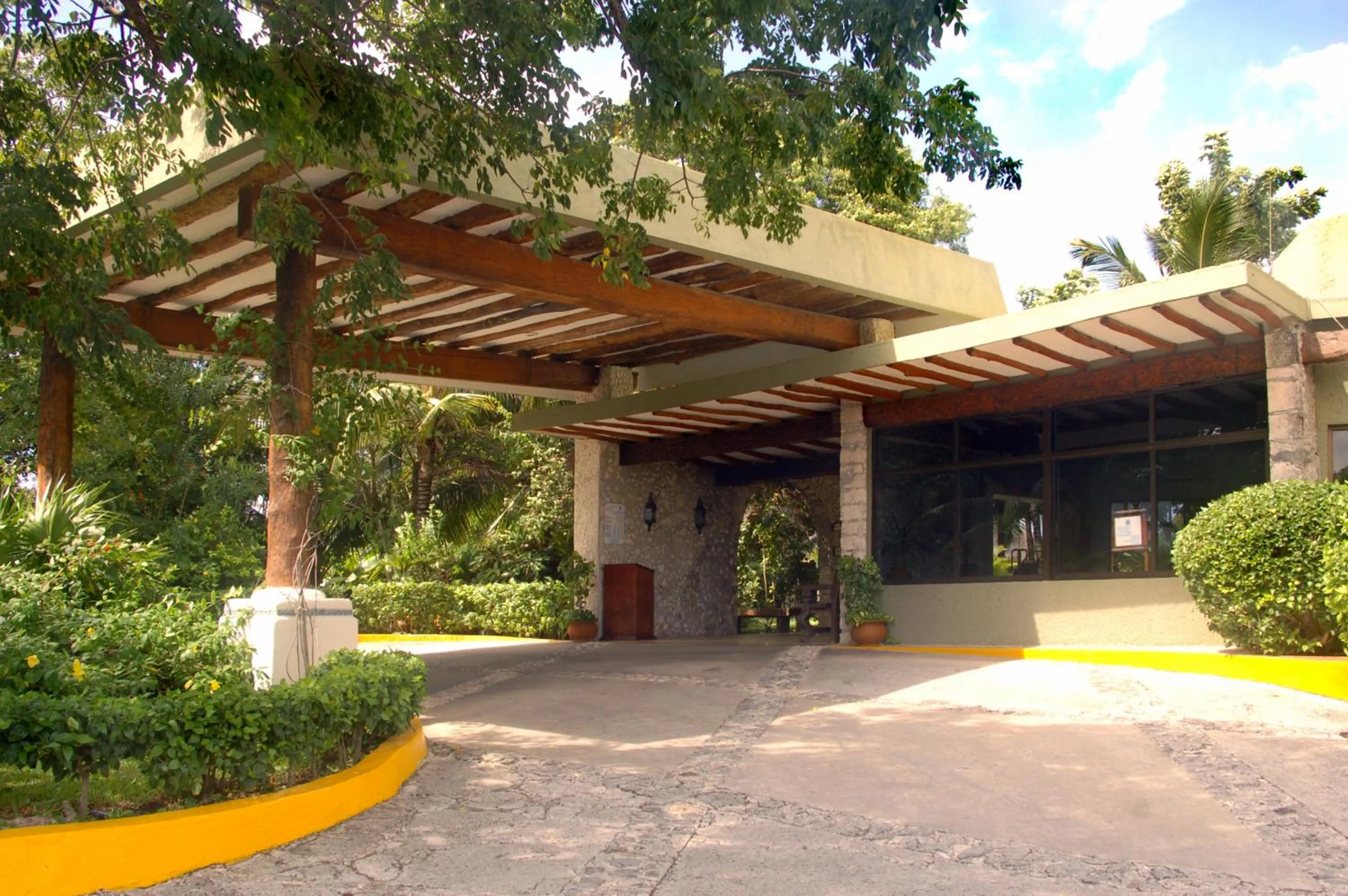 Facade/entrance in Casa del Mar Cozumel Hotel & Dive Resort with free access to an exclusive beach club