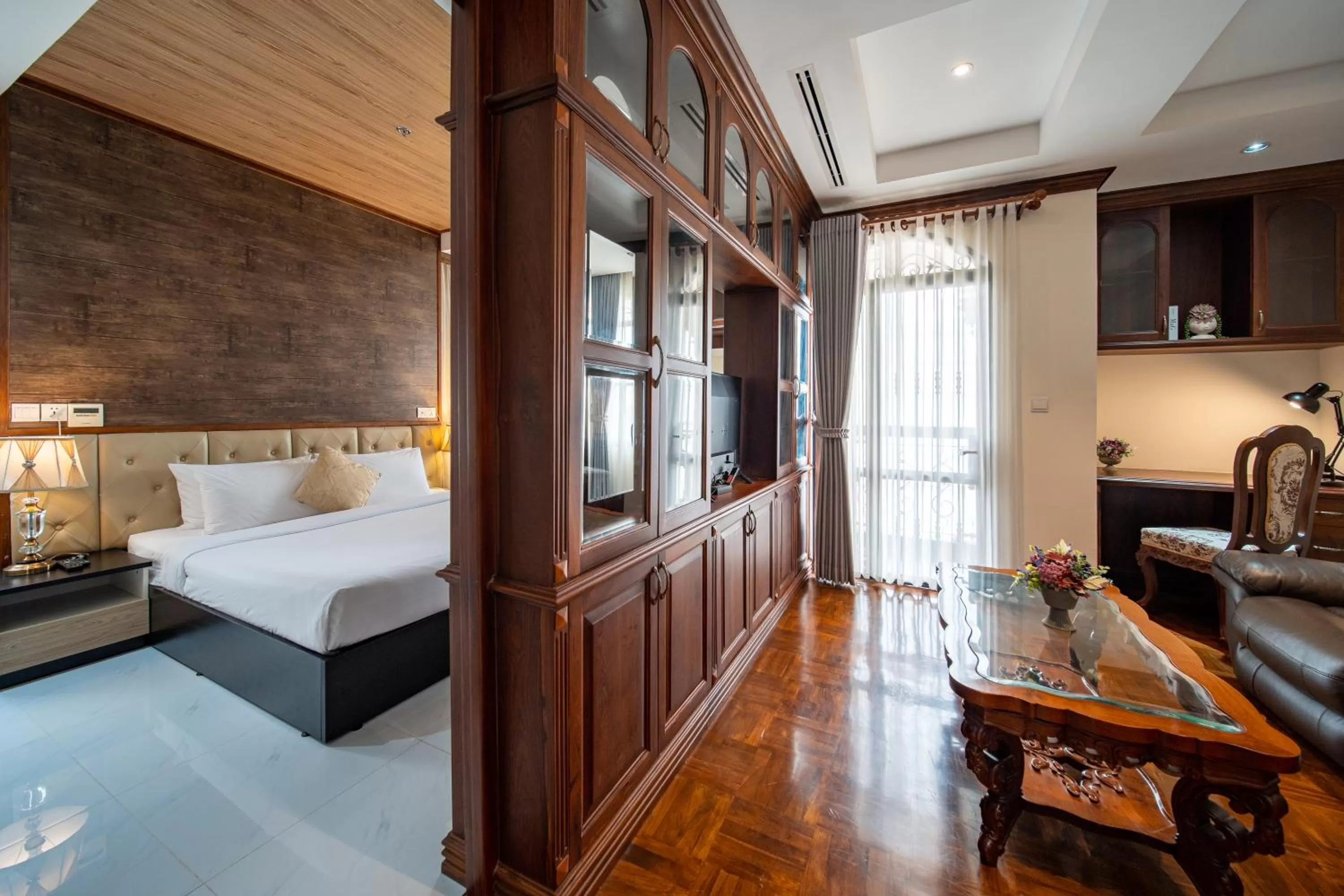 Seating area, Bed in LCS Hotel & Apartment